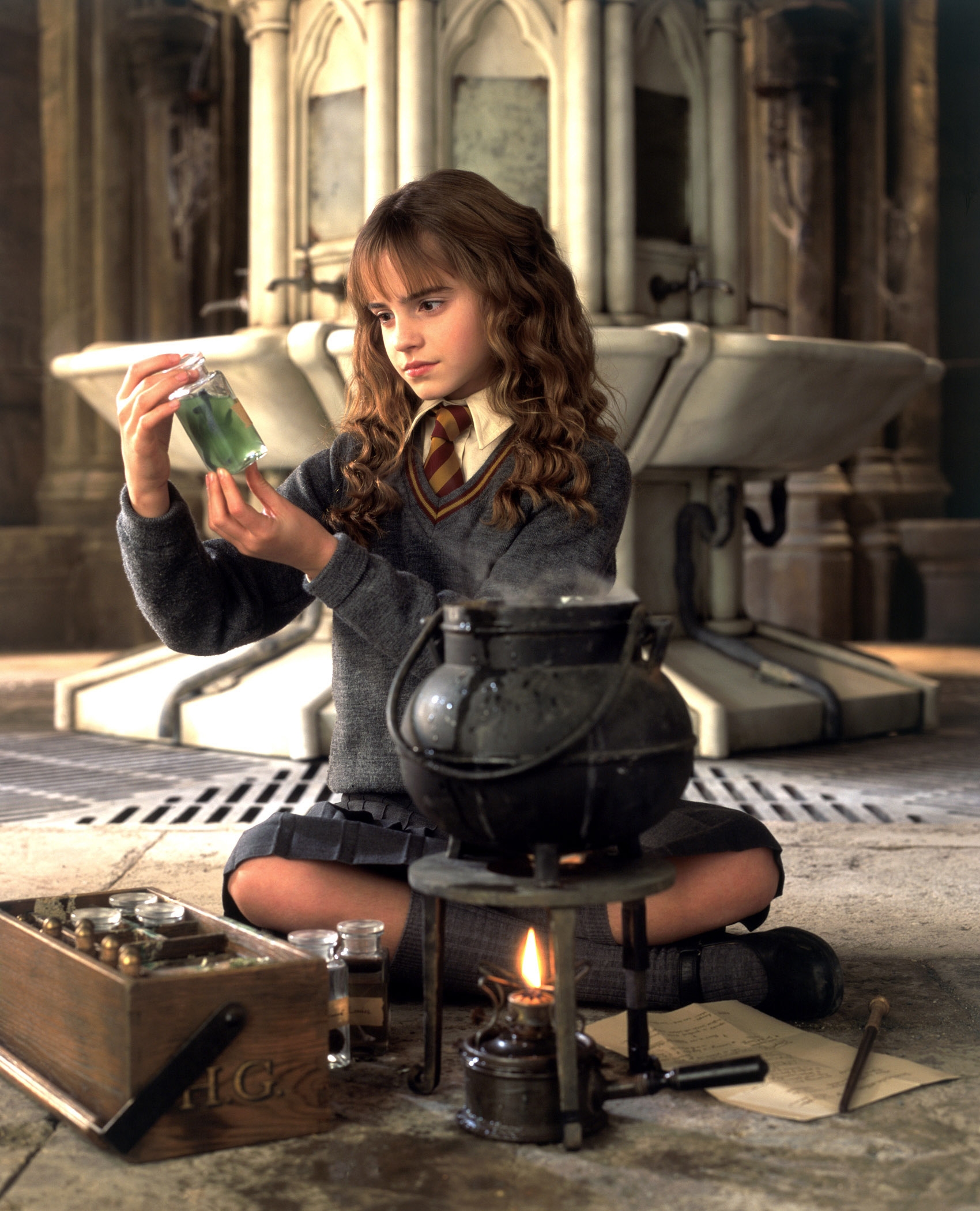 Young Emma Watson arsenic  Hermione examining a potion vial
