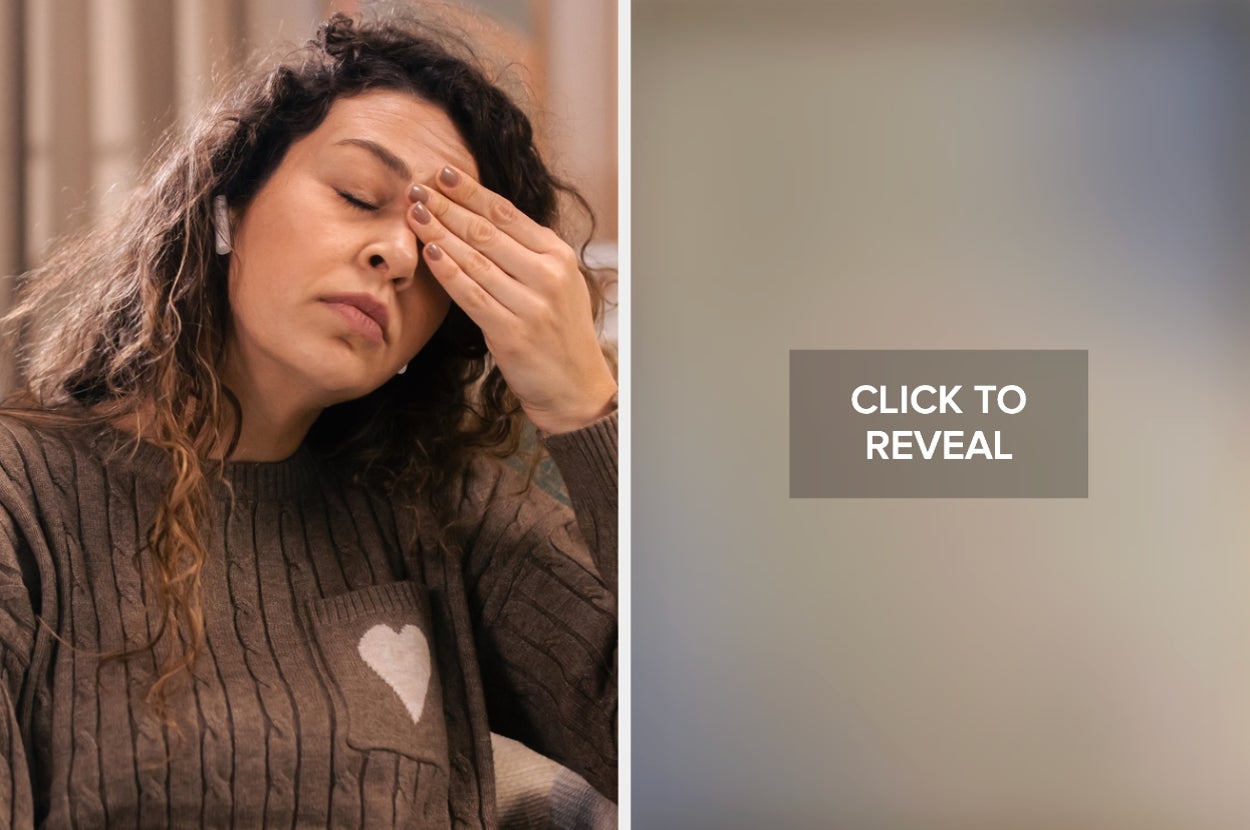 Woman with long hair and a heart-patterned sweater looks tired, rubbing her eyes while wearing earbuds. Blurred section with "Click to Reveal" text
