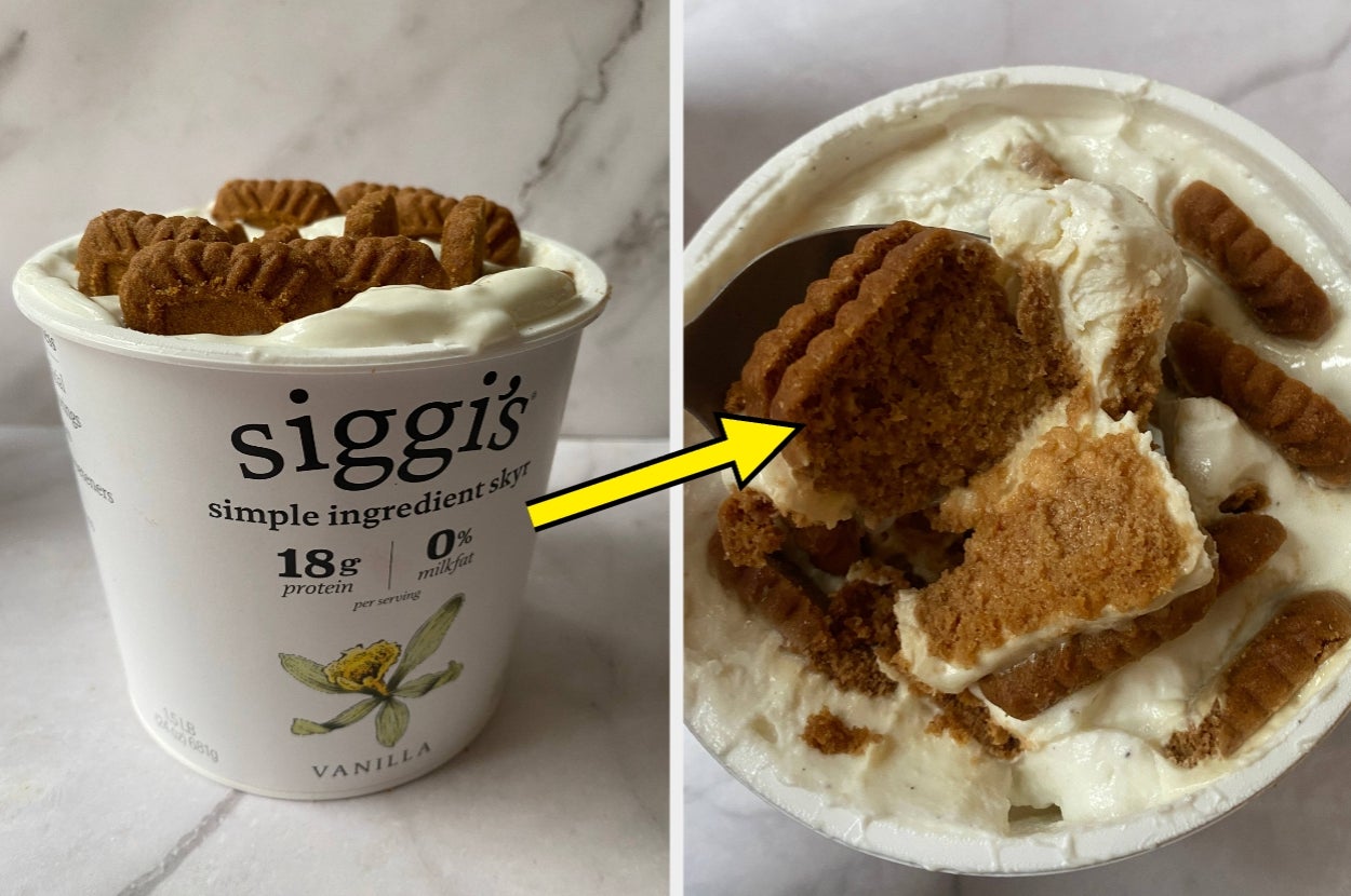 A cup of vanilla yogurt topped with crunchy cookies, some mixed inside, showcasing a creamy and crunchy textural combination