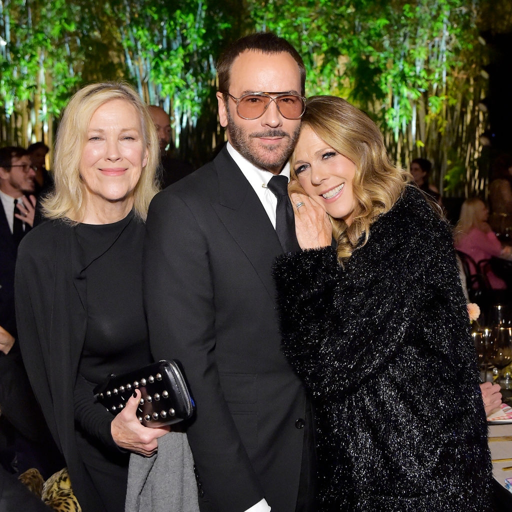 Three individuals airs  astatine  an event; 1  wears a achromatic  suit, different  a achromatic  formal  with studs, and the 3rd  wears a textured achromatic  coat