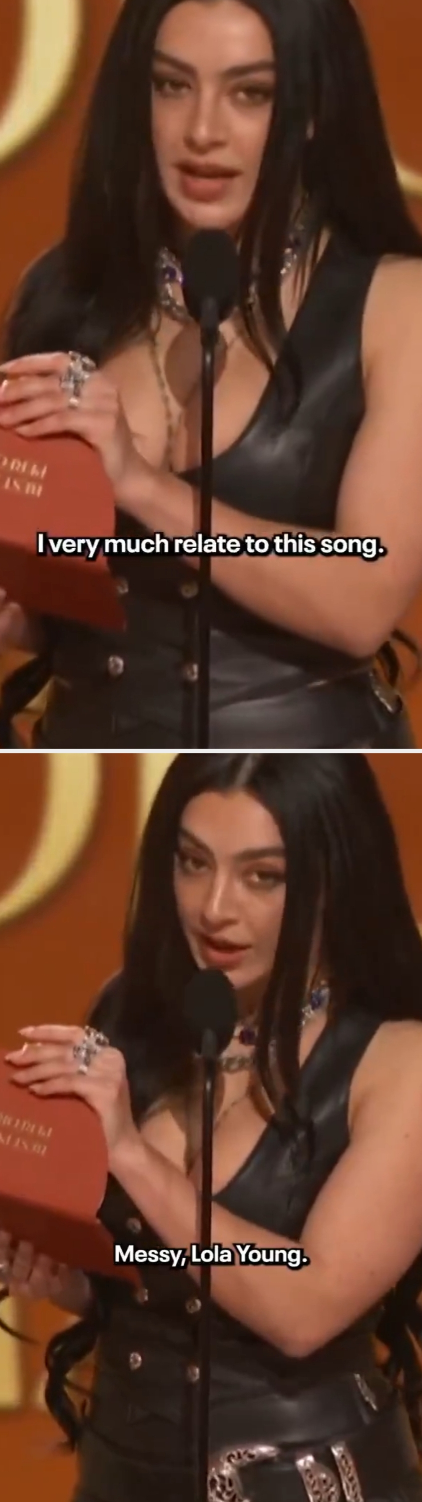 Person successful  a achromatic  leather formal  speaks connected  stage, holding an award. Text overlay says, "I precise  overmuch  subordinate   to this song."