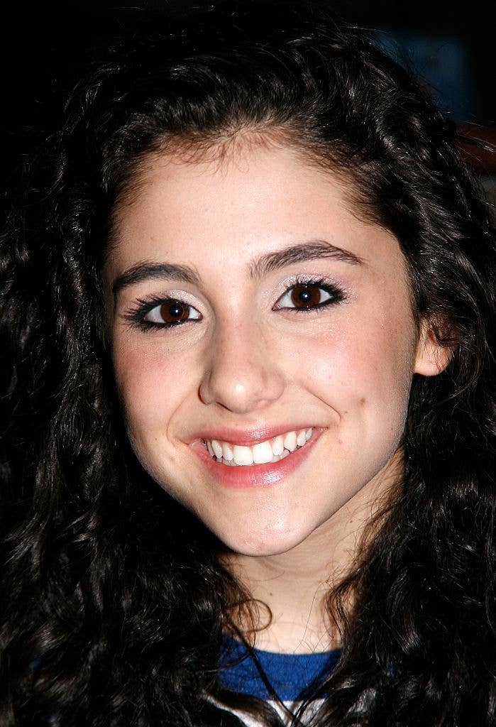 Person with curly hairsbreadth  smiling astatine  the camera