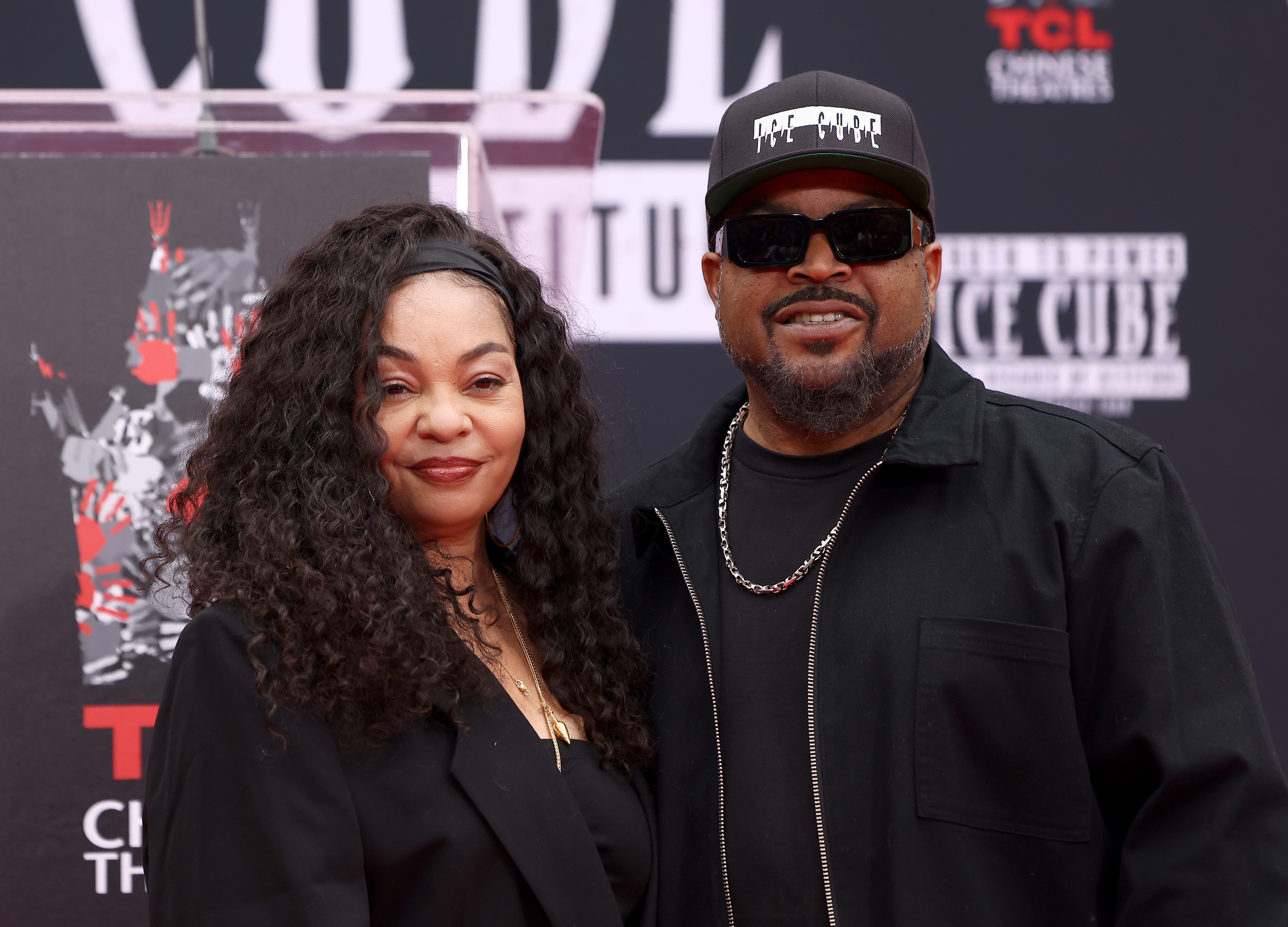 Kimberly Woodruff and Ice Cube be  the manus  and footprint successful  cement ceremonial  for Ice Cube astatine  TCL Chinese Theater