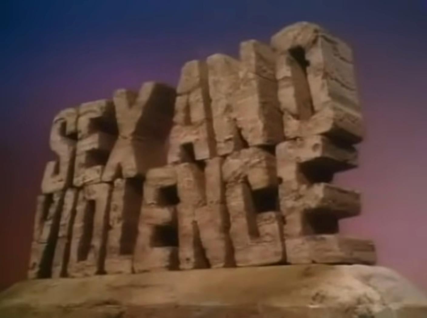 Stone-carved artifact letters signifier the words "Sex and Violence" against a elemental background