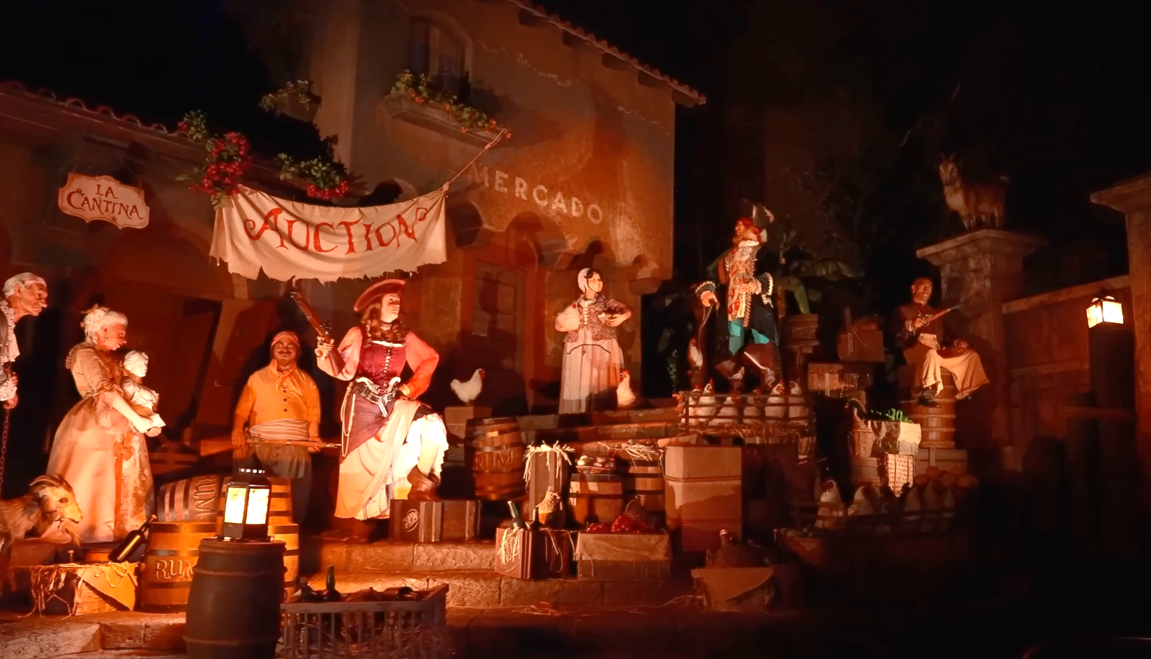 A vintage auction scene at a themed attraction, featuring animatronic figures in period costumes, interacting with a crowd amid market decor