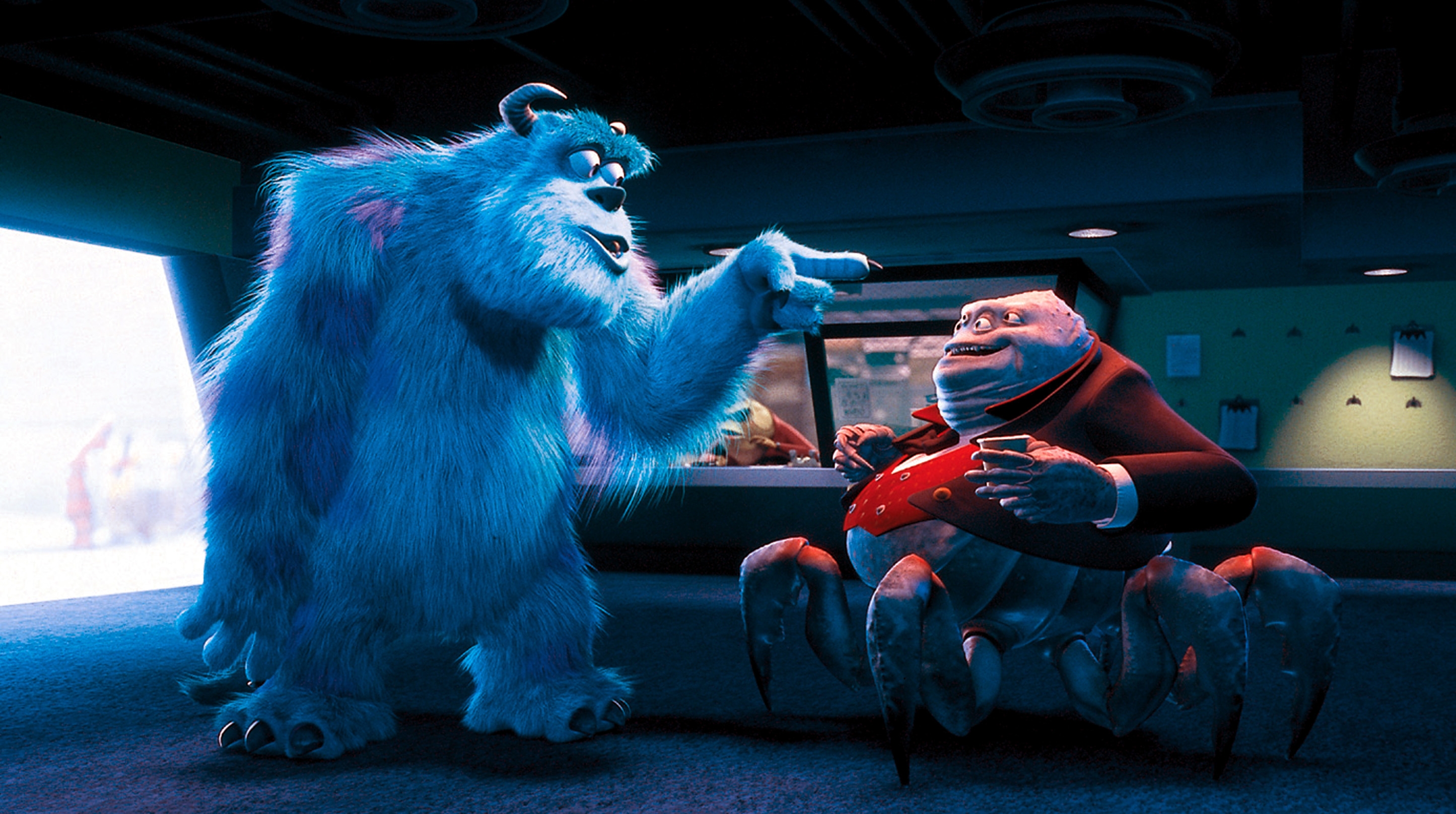 A furry monster animated character argues with a crab-like creature in a business suit in a factory setting