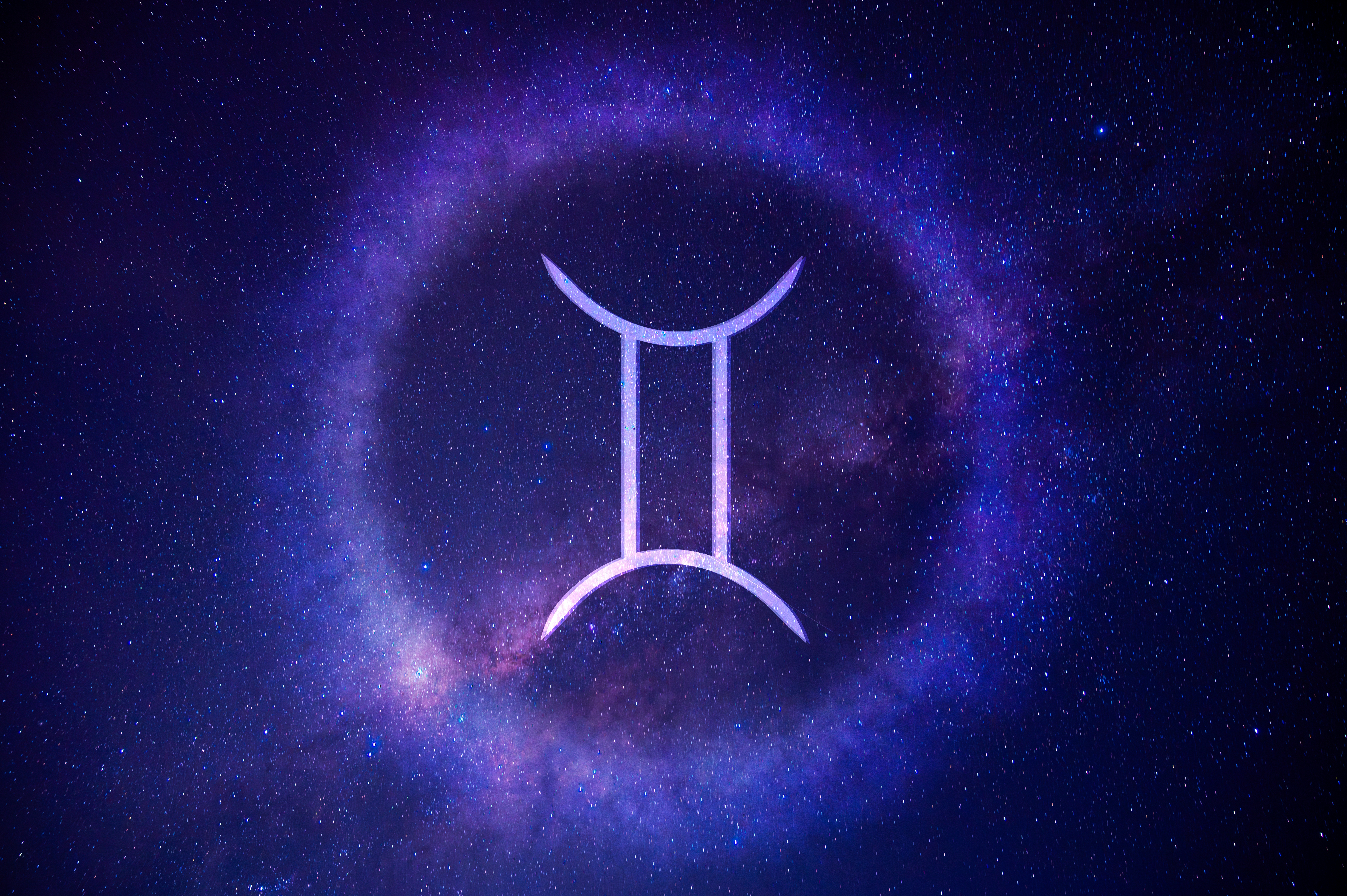 Gemini zodiac awesome    centered wrong   a glowing ellipse  against a starry nighttime  sky
