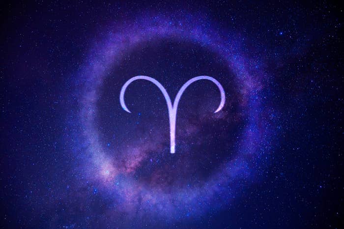 Aries zodiac awesome    glowing against a cosmic starry background