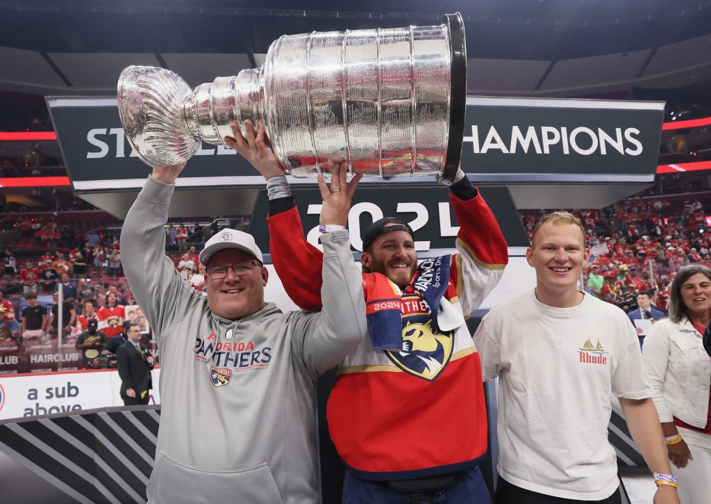Keith, Matthew, and Brady celebrating with Stanley cup