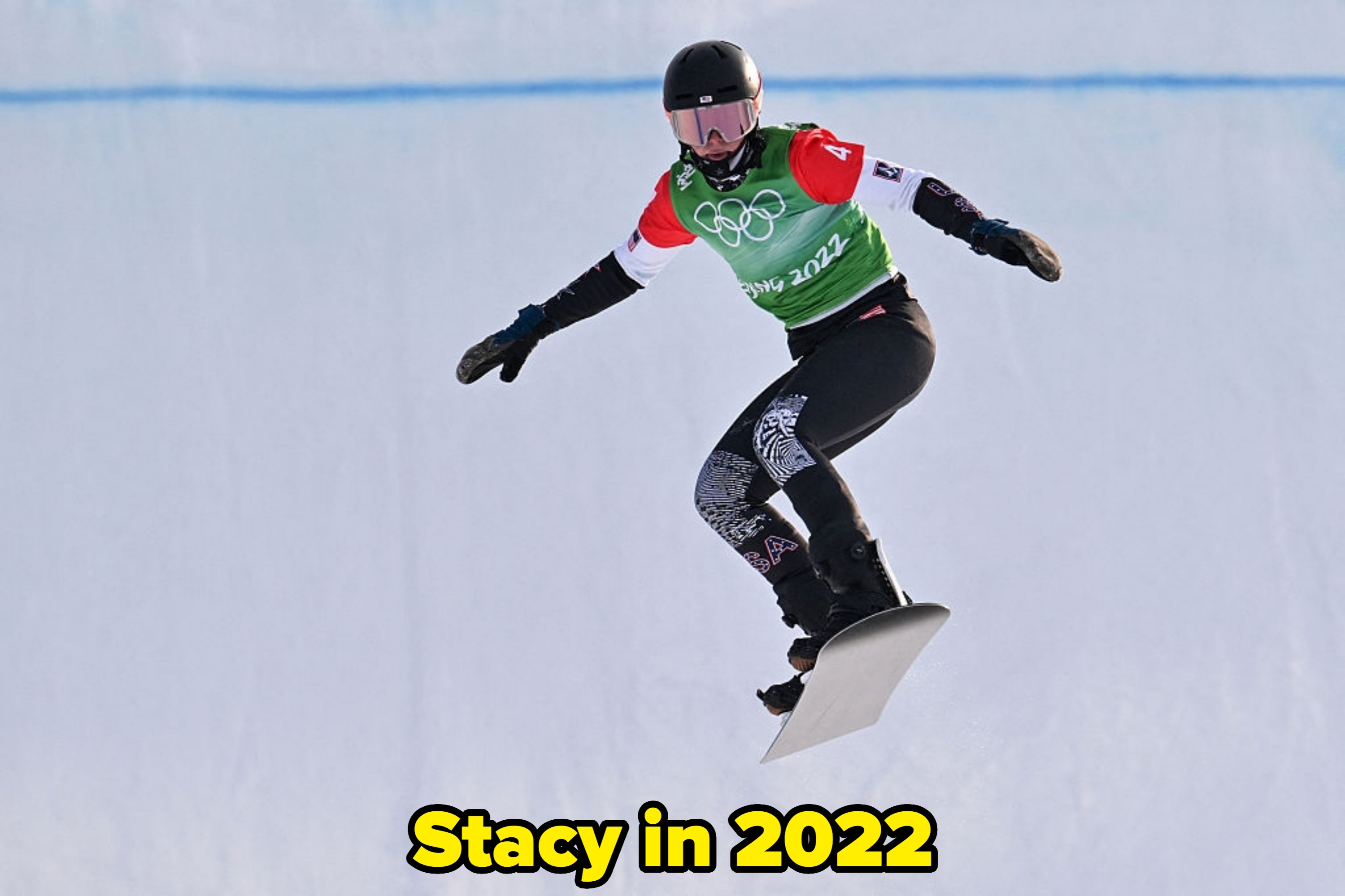 Stacy performing a mid-air instrumentality   successful  2022
