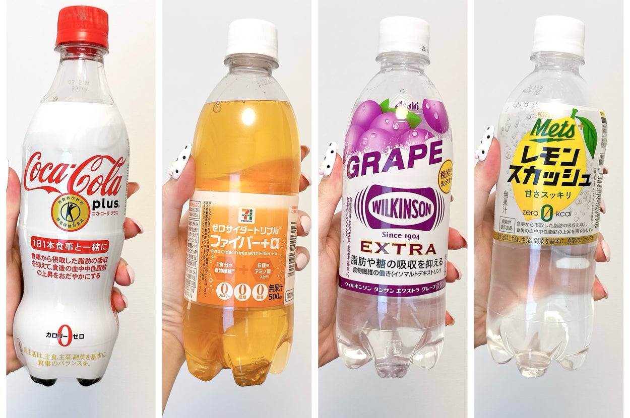 4種類の炭酸飲料ボトルが並んでいる。それぞれ異なるブランドとフレーバー。