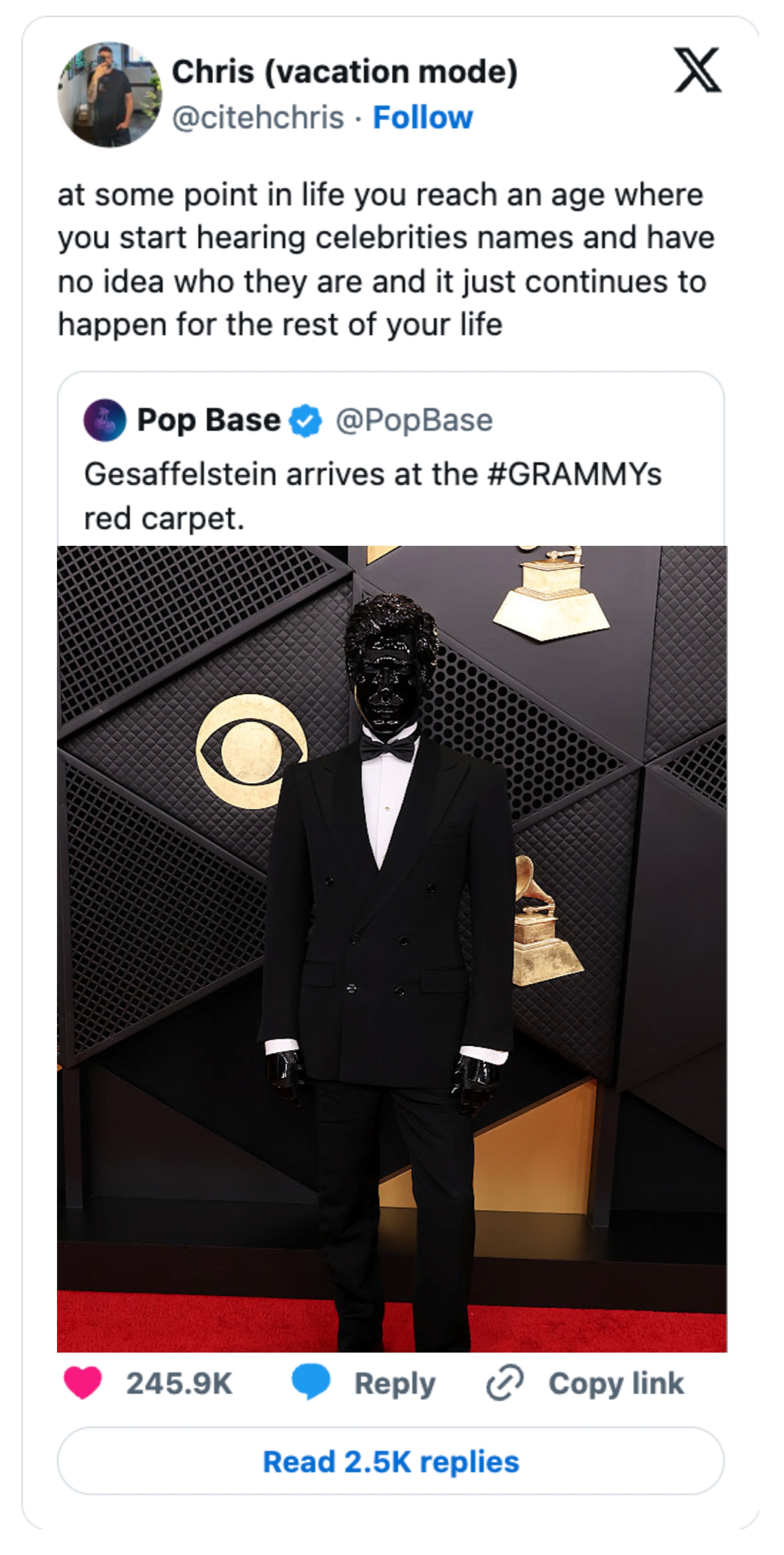 Person successful  acheronian  suit   and helmet connected  reddish  carpet with Grammy awards backdrop. Tweet astir  recognizing celebrities' names arsenic  you age