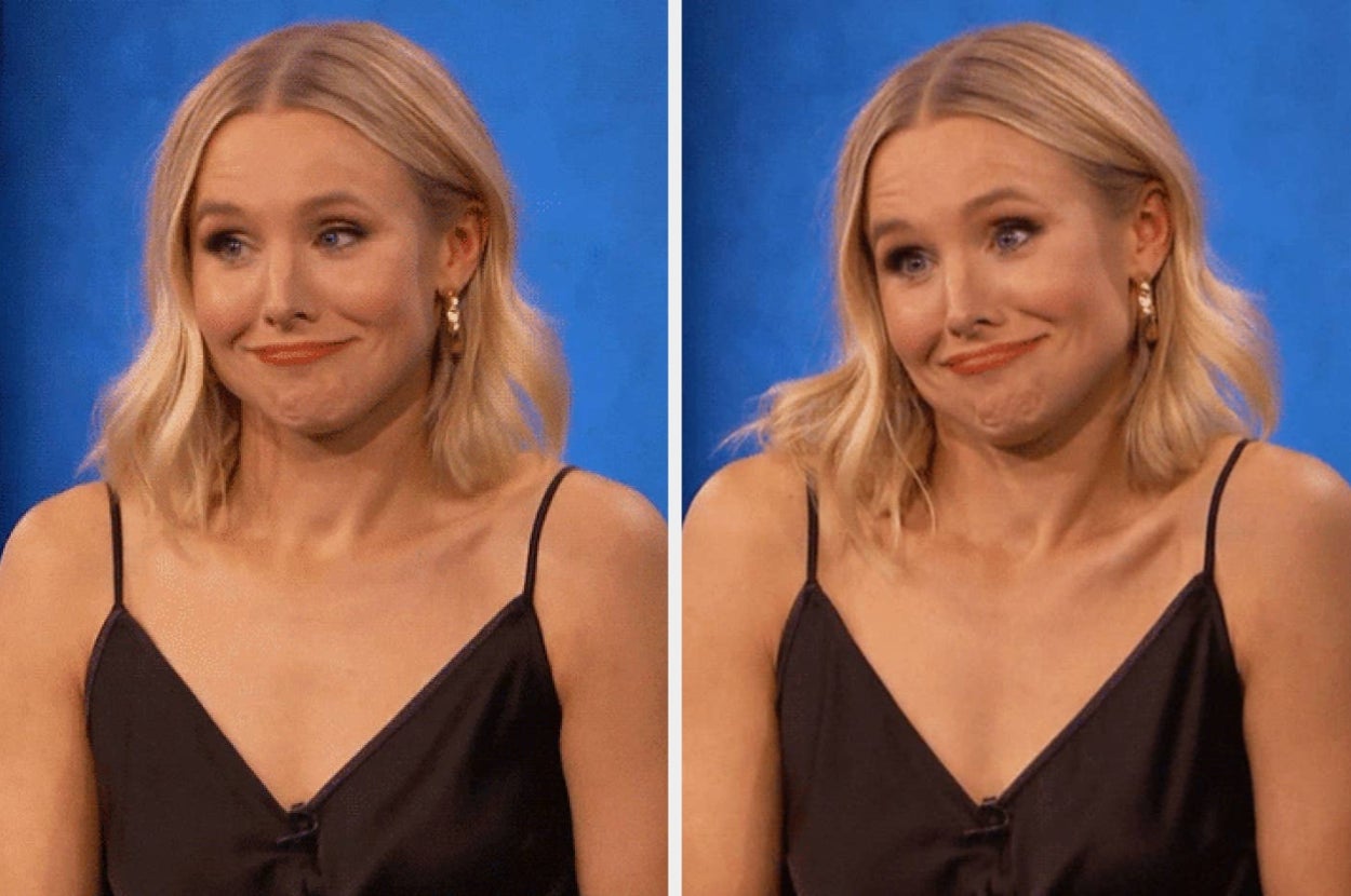 A person with shoulder-length hair, wearing a sleeveless top, makes a comical expression with raised eyebrows and a lopsided smile