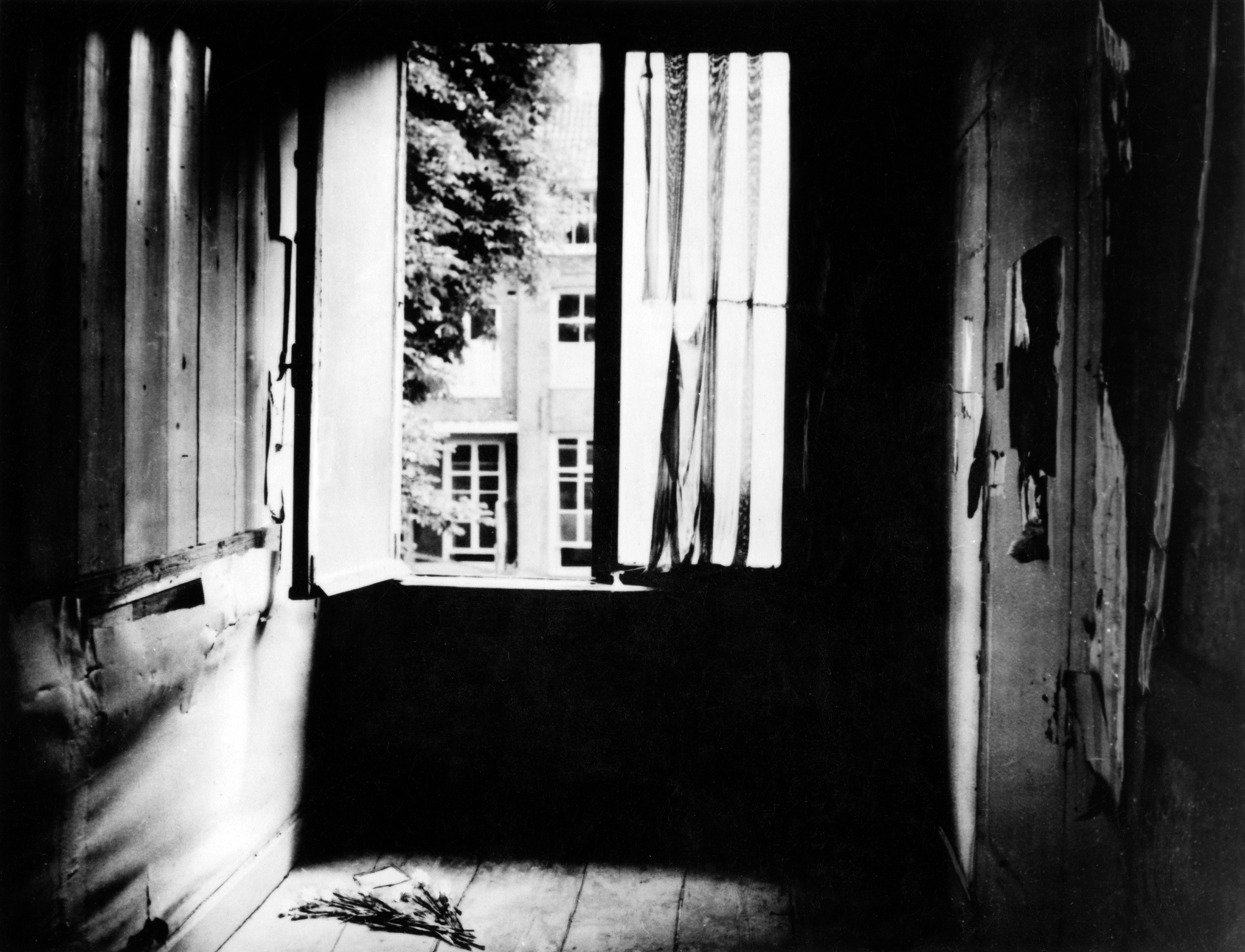 Dimly lit country   with an unfastened  window, letting successful  airy  and showing a presumption    of a gathering  outside. A subdivision  lies connected  the floor