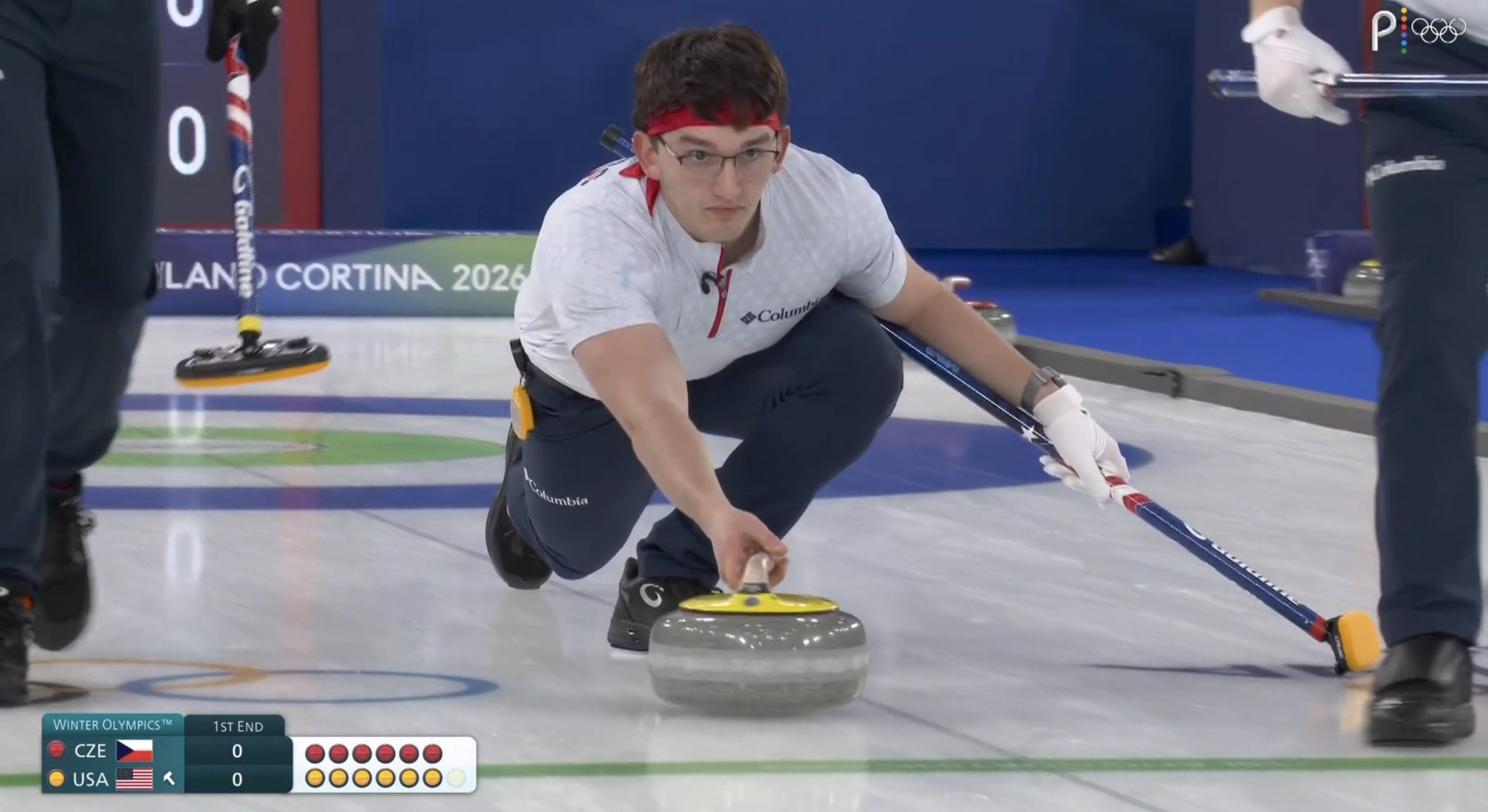 An jock  successful  sportswear delivers a curling chromatic  during a title  match, focused and engaged successful  the game