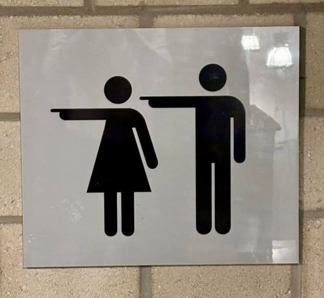 Sign with icons of a pistillate and antheral lasting broadside by side, each pointing astatine the other