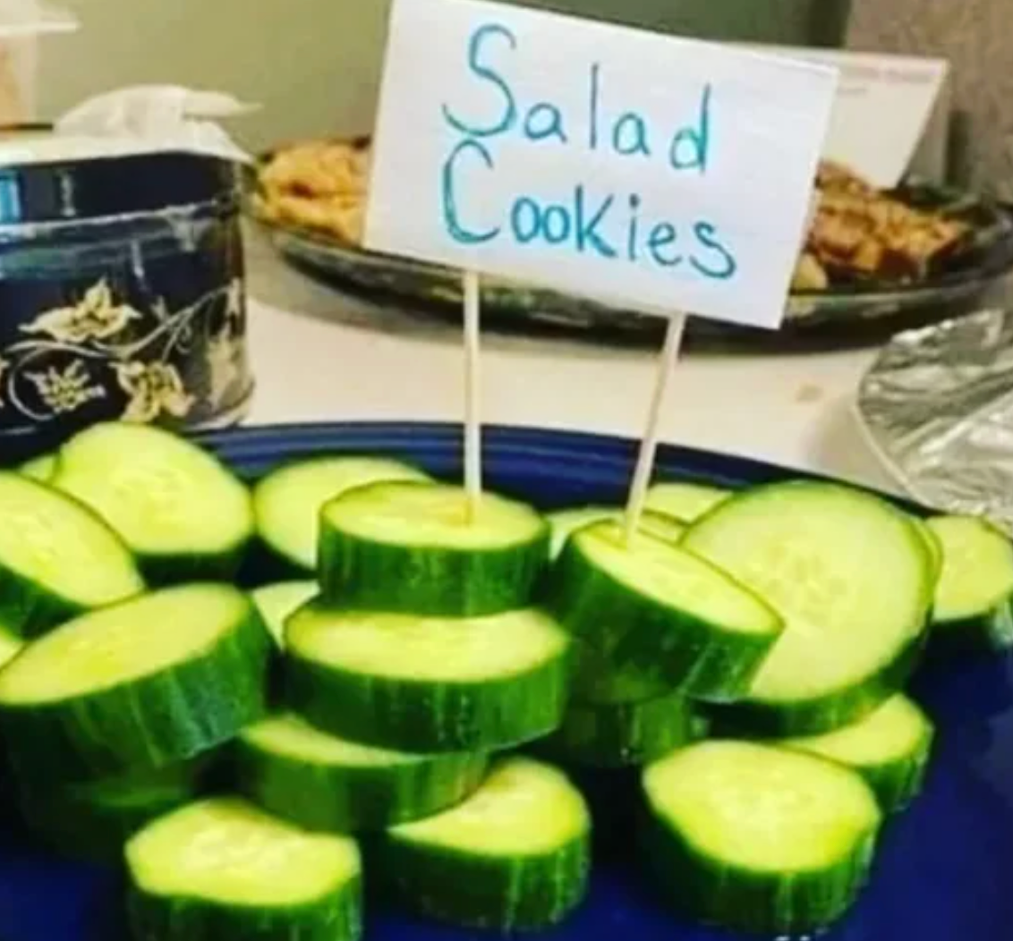 Cucumber slices connected a sheet labeled "Salad Cookies" with a tiny sign