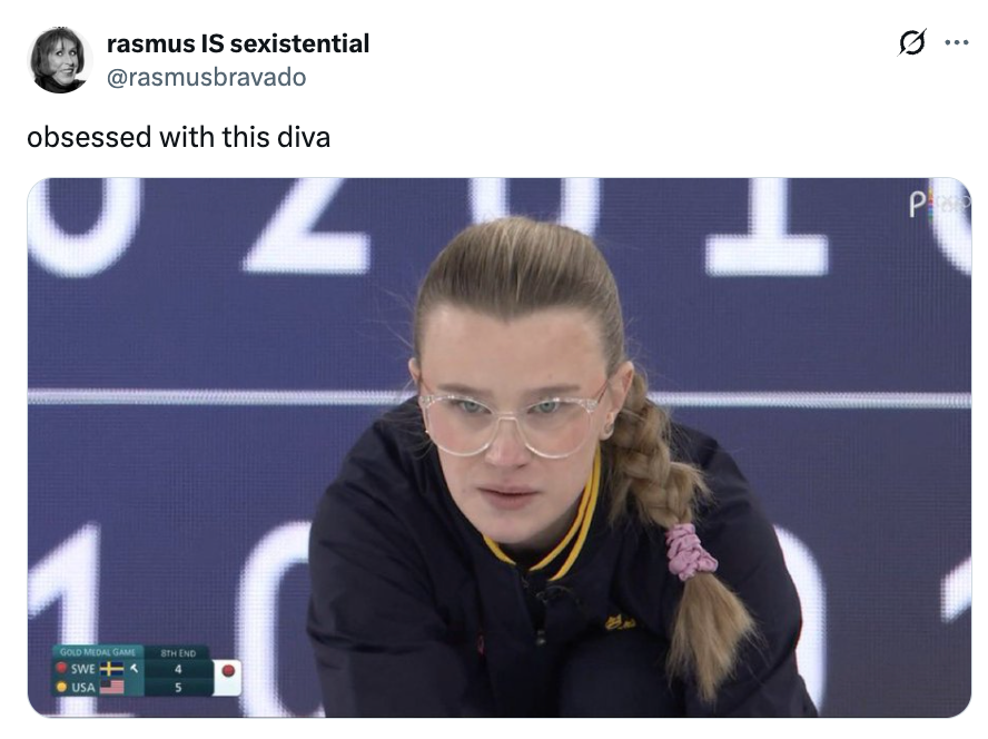 Person concentrating intently during a curling match, wearing glasses and a ponytail. Scoreboard disposable   successful  background