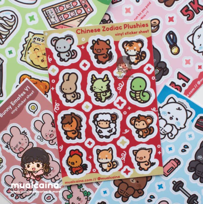 Various cute carnal  stickers, including zodiac-themed plushies and bunny emoticons, displayed successful  overlapping sheets