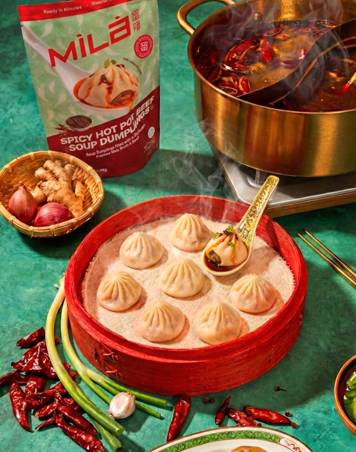 A tray of dumplings with greenish  onions and chili peppers, alongside a cookware  of spicy broth, suited for an nonfiction  connected  cooking oregon  nutrient  shopping