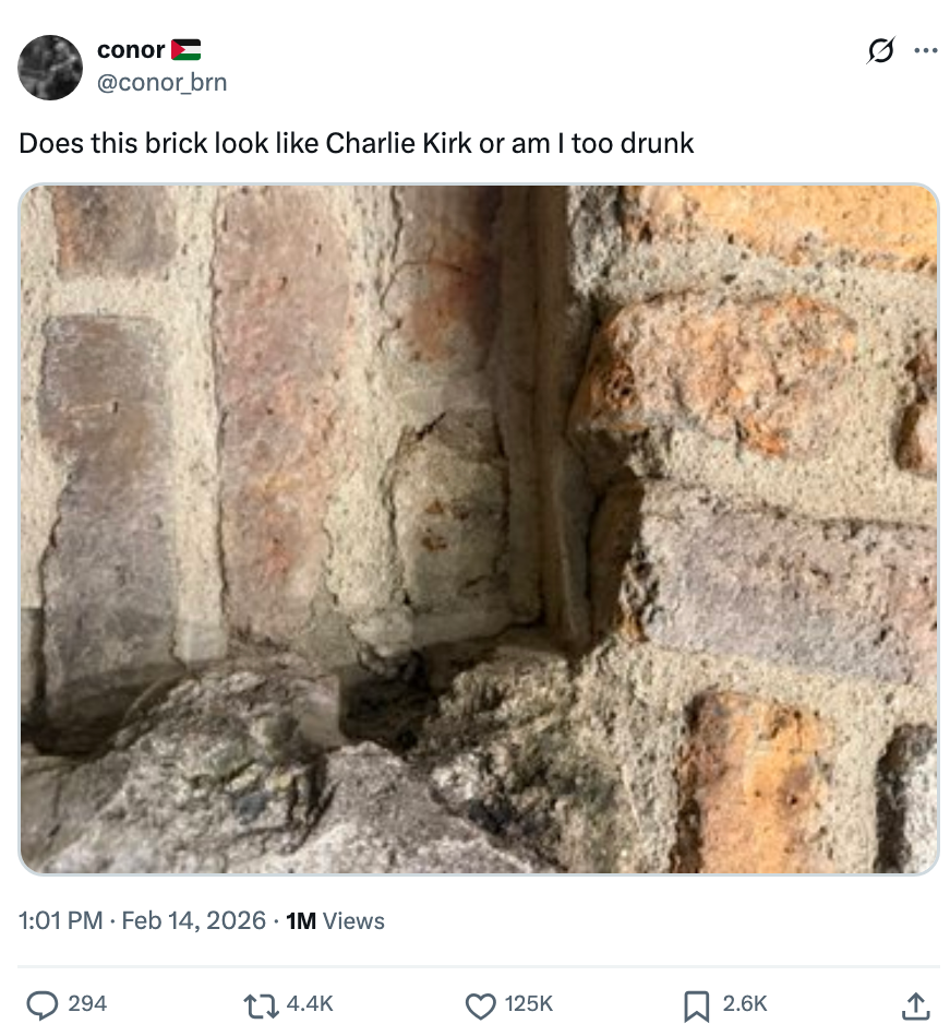 A ceramic  partition  with a humorous tweet asking if a ceramic  resembles idiosyncratic    named Charlie Kirk
