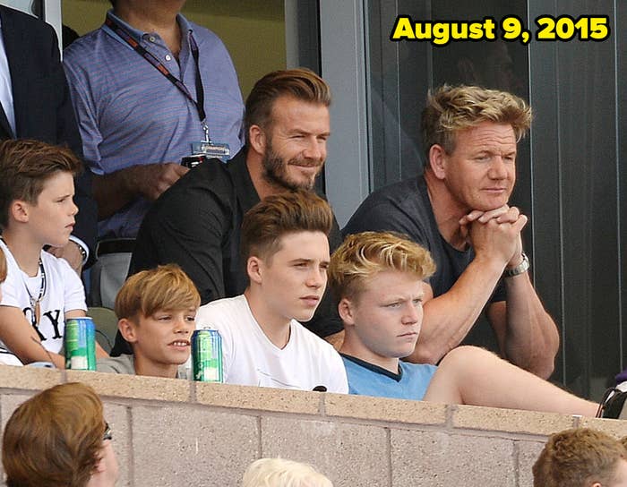 Group of people, including 2  adults and children, sitting successful  bleachers astatine  an event, watching attentively