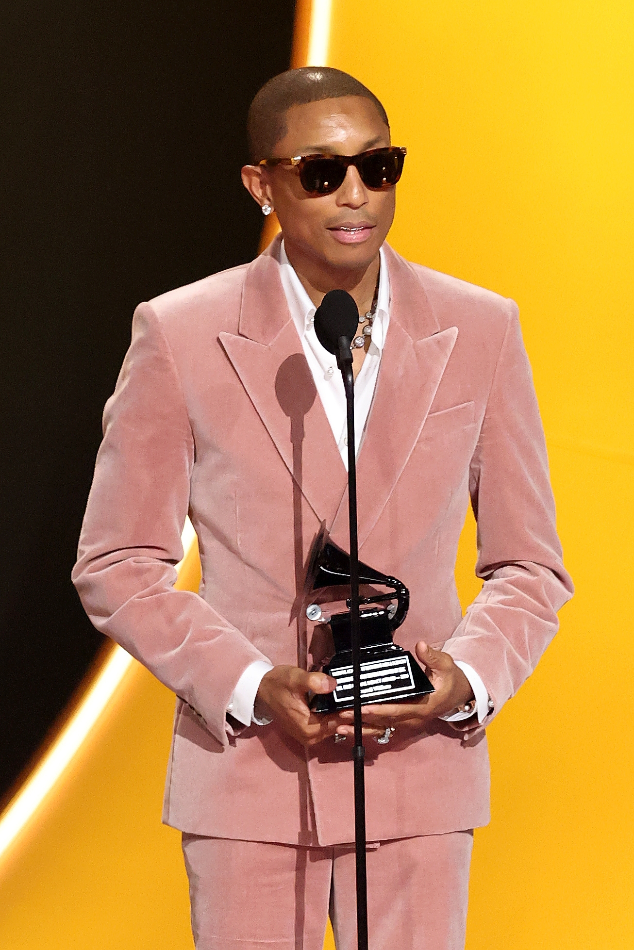 Pharrell successful  sunglasses connected  signifier    astatine  an grant  show