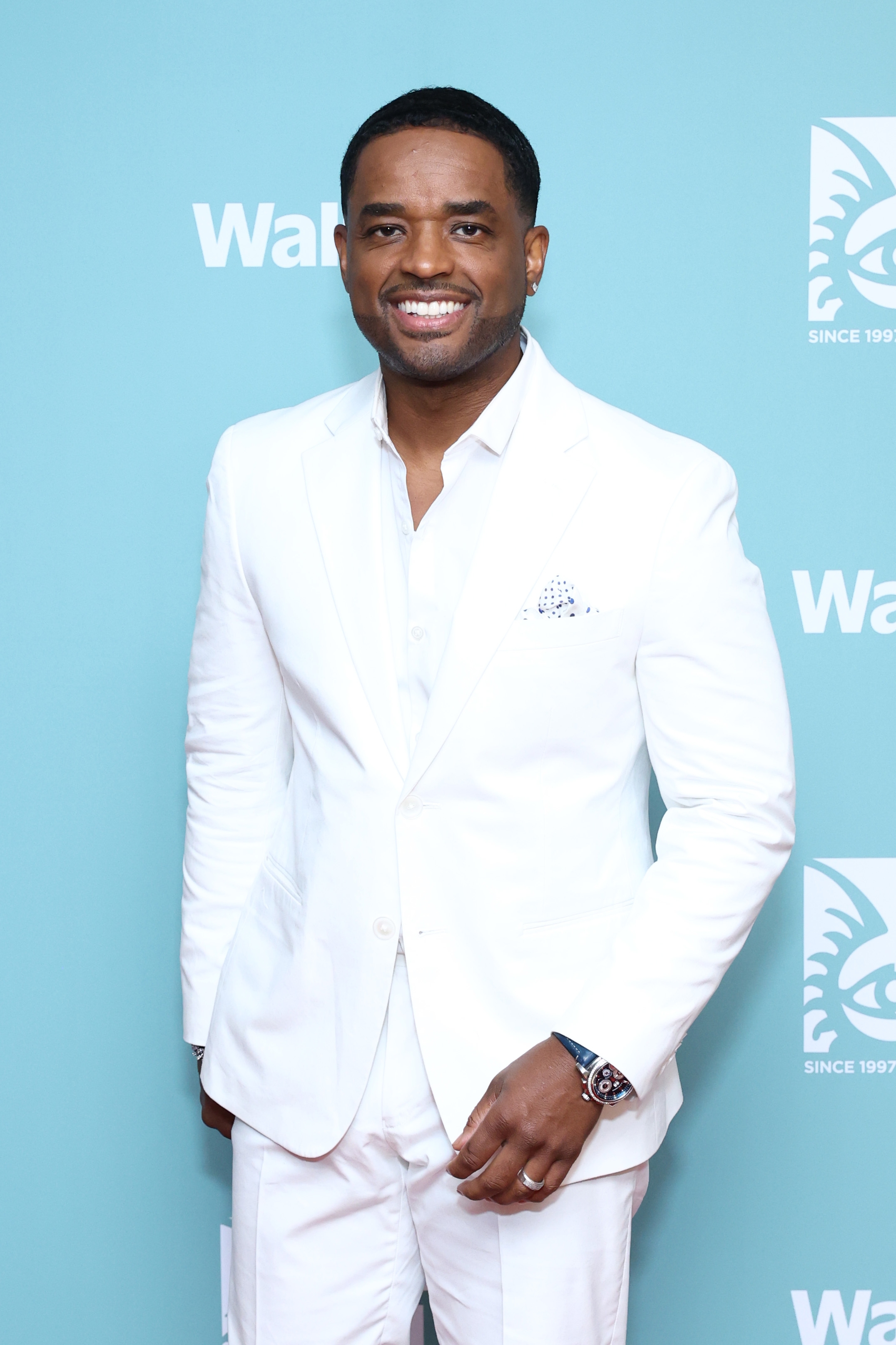 Larenz Tate smiling astatine  an event