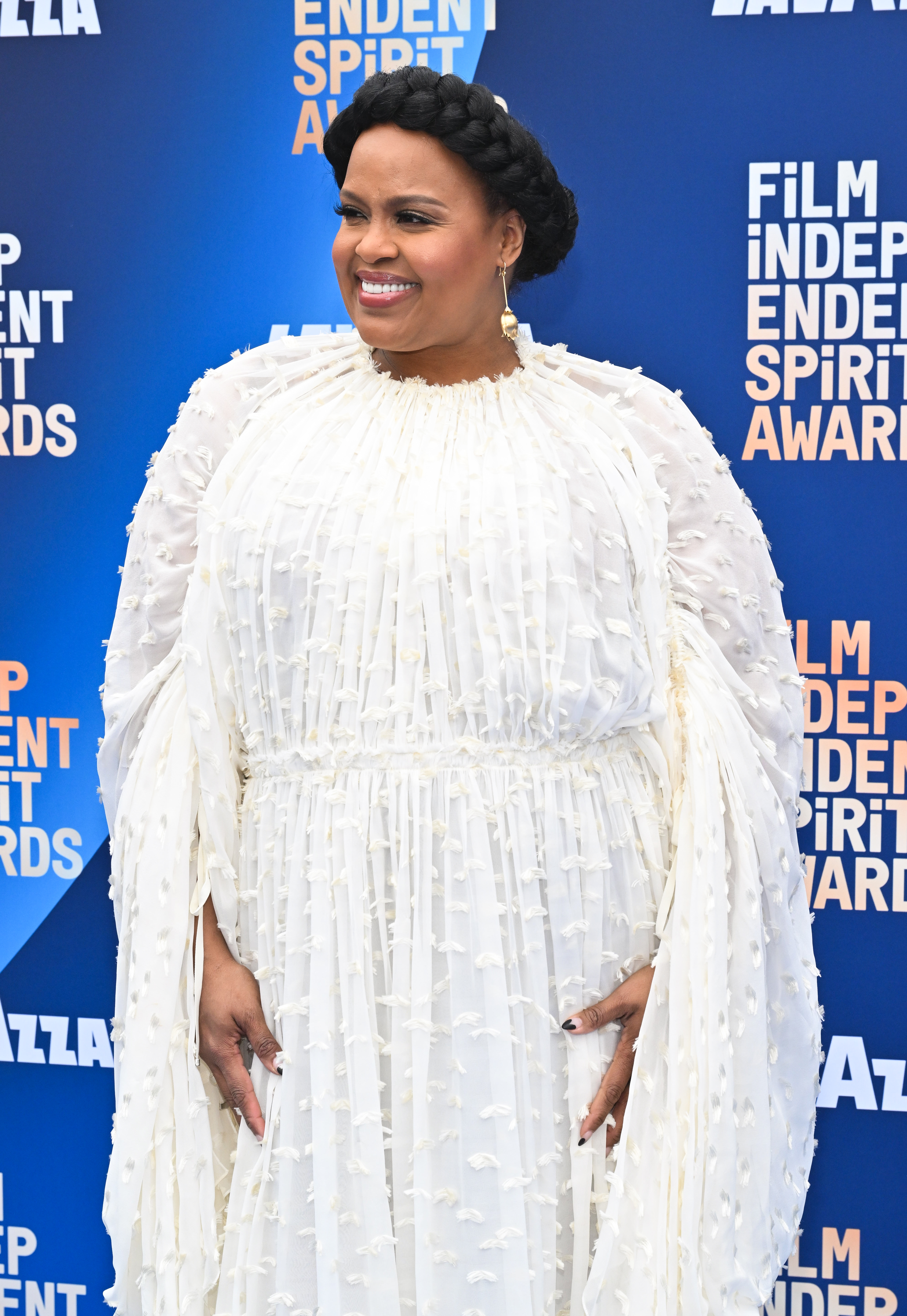 Natasha Rothwell connected  a reddish  carpet