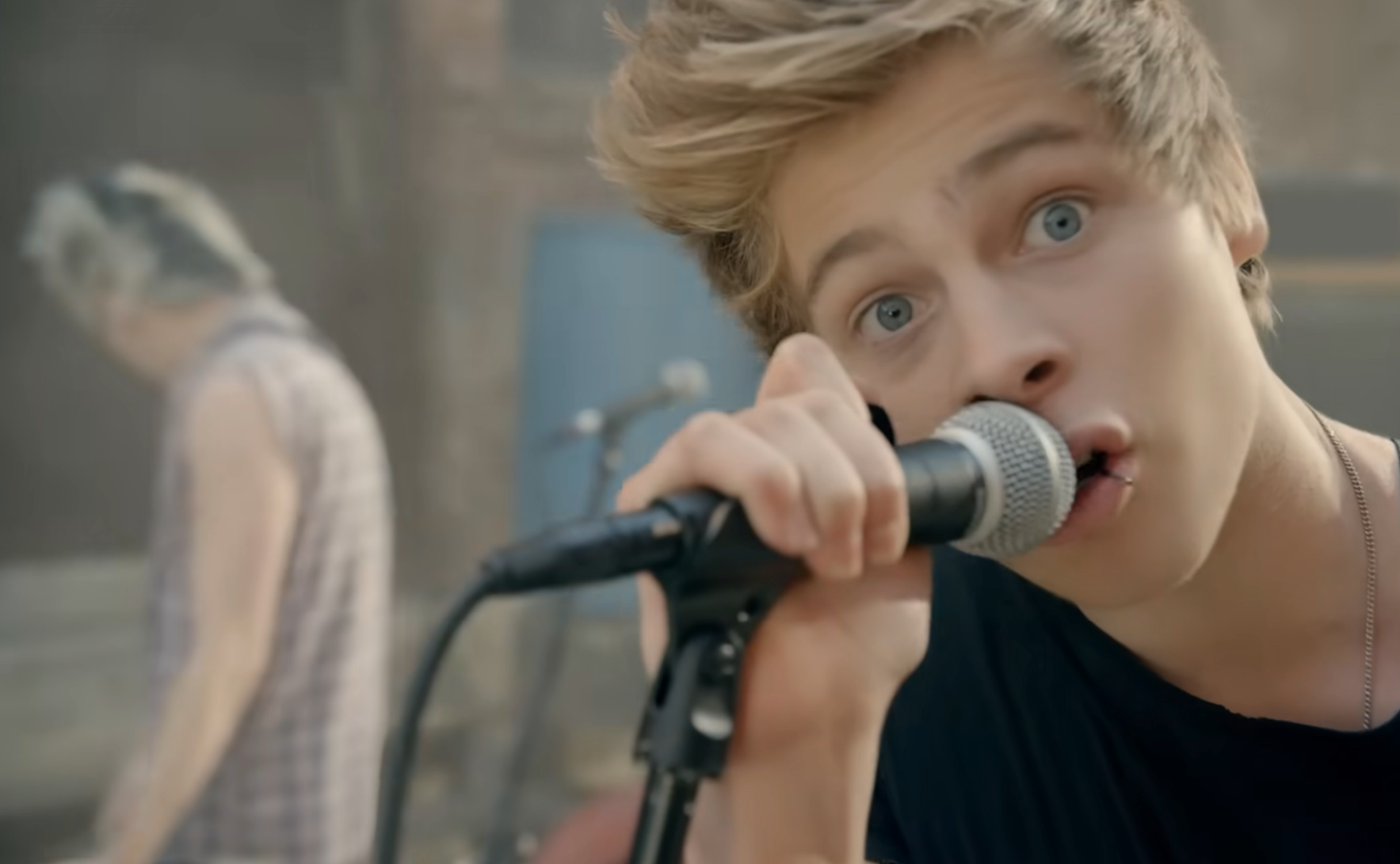Luke Hemmings successful the "She Looks So Perfect" euphony video