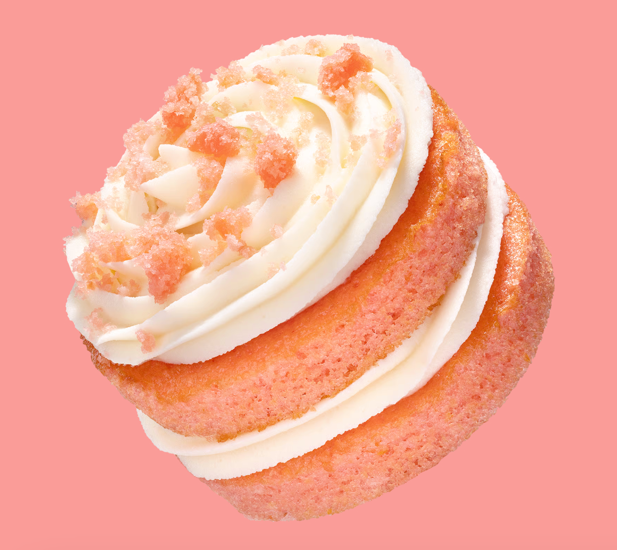 A pinkish  and pick  frosted cupcake topped with crumbled bits, connected  a plain background