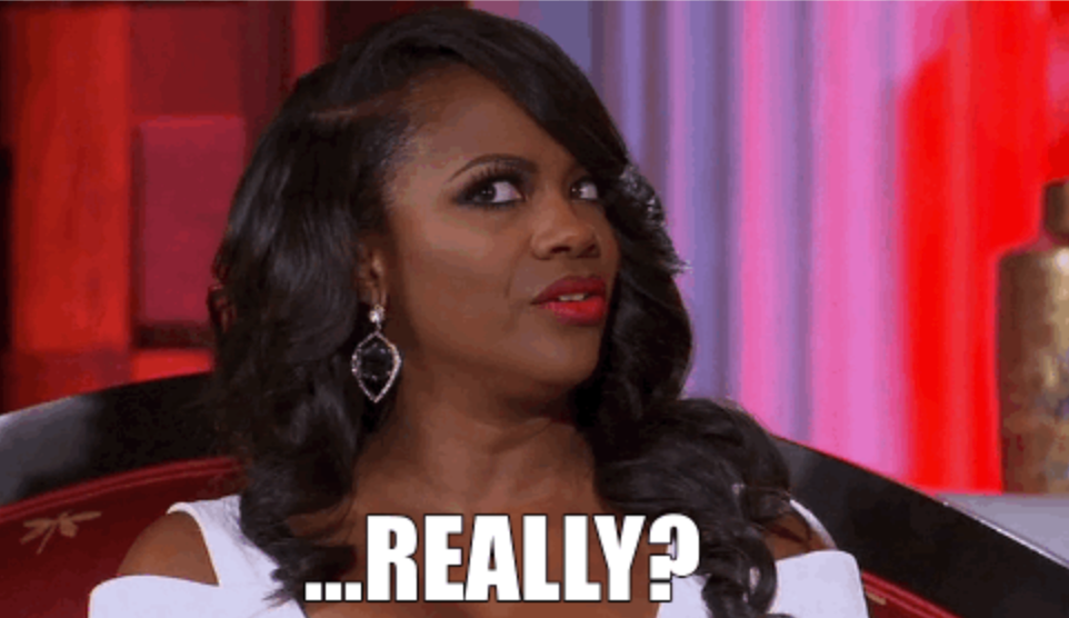 Woman with a amazed  expression, wearing ample  earrings and a achromatic  top. Text astatine  the bottommost  reads, "...REALLY?"