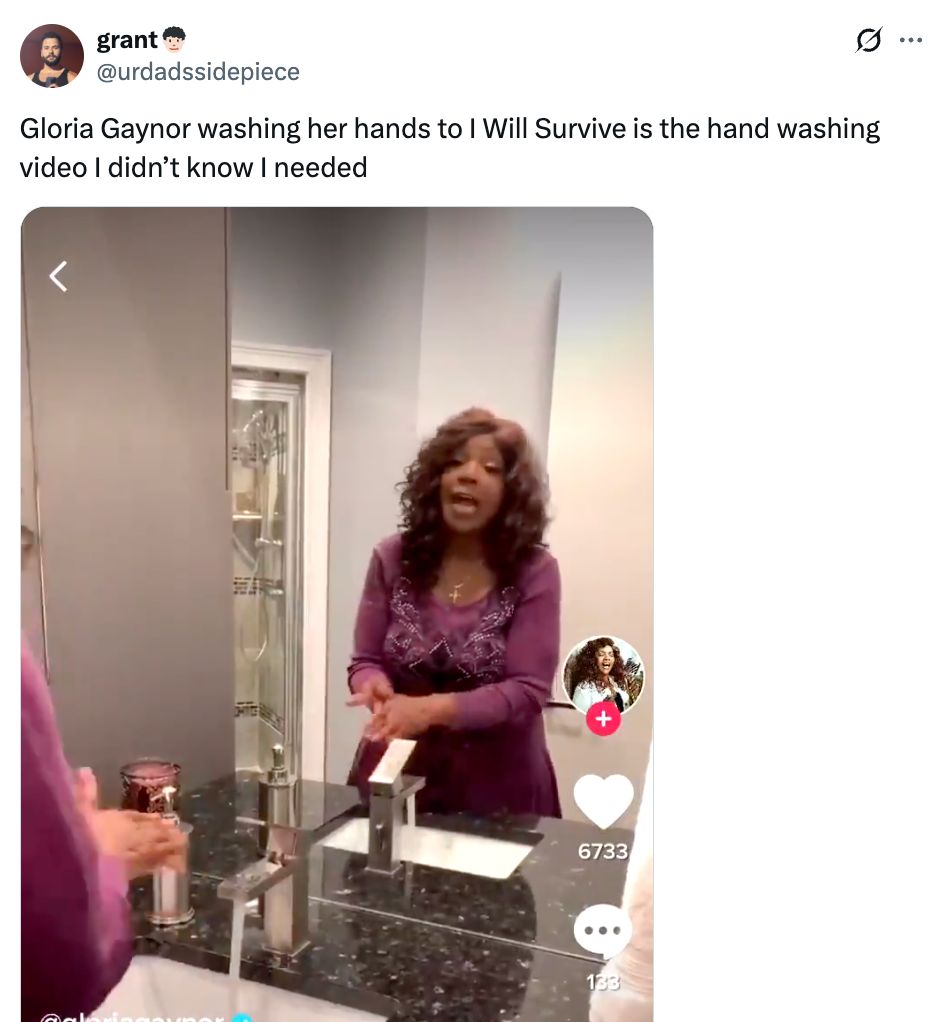 Gloria Gaynor in a video washing hands while singing "I Will Survive," with the video's likes and comments count visible. Tweet text above references this