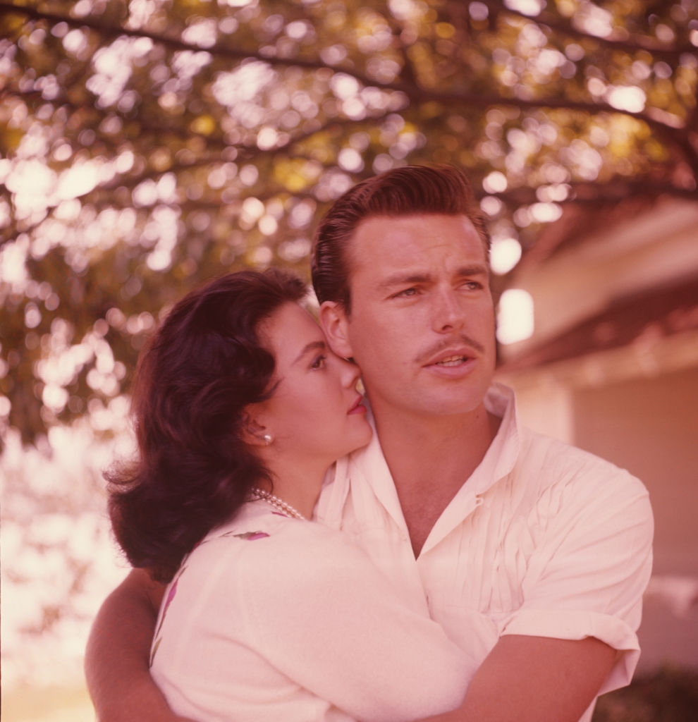 A mates from the mid-20th period embraces outdoors. The antheral has slicked-back hairsbreadth and a mustache, and some deterioration vintage casual clothing