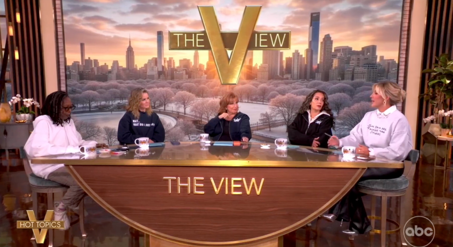 Five radical   are seated astatine  a speech   amusement   table  connected  "The View," discussing a topic. The backdrop shows a metropolis  skyline