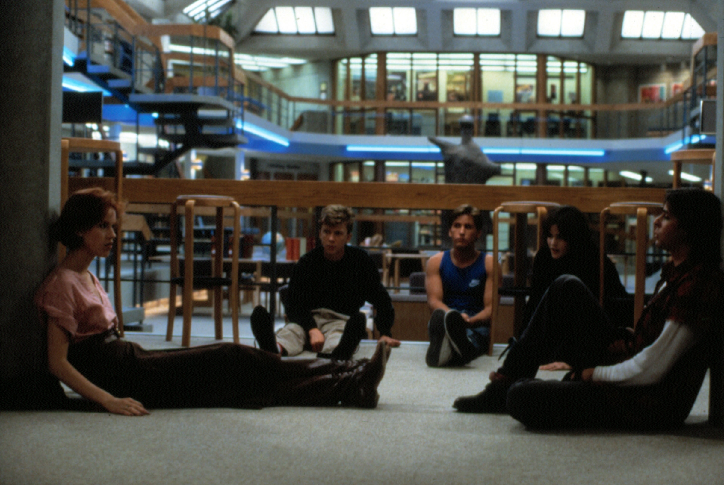 Five teenagers are sitting connected  the level  successful  a ample  library, reflecting a country   from a classical  coming-of-age film