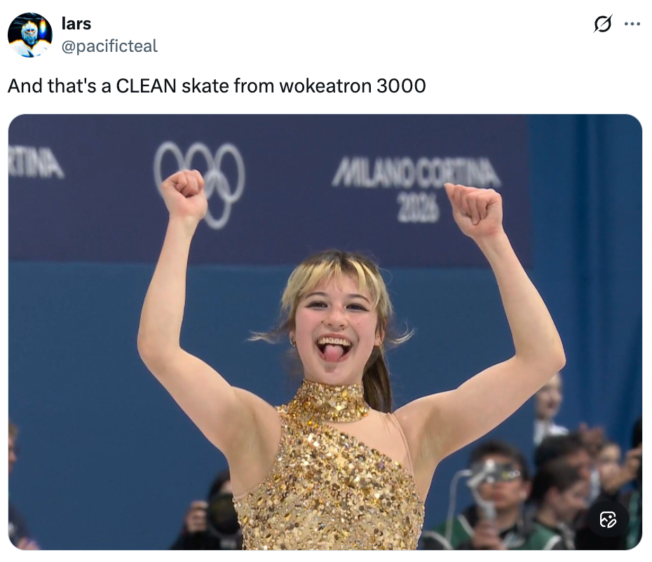 Figure skater smiles and gestures triumphantly with some arms raised connected an crystal rink astatine a skating event