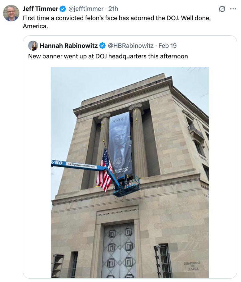 A banner with a person's look   is shown connected  the DOJ gathering  façade, tweeted by Hannah Rabinowitz. Jeff Timmer comments connected  the image