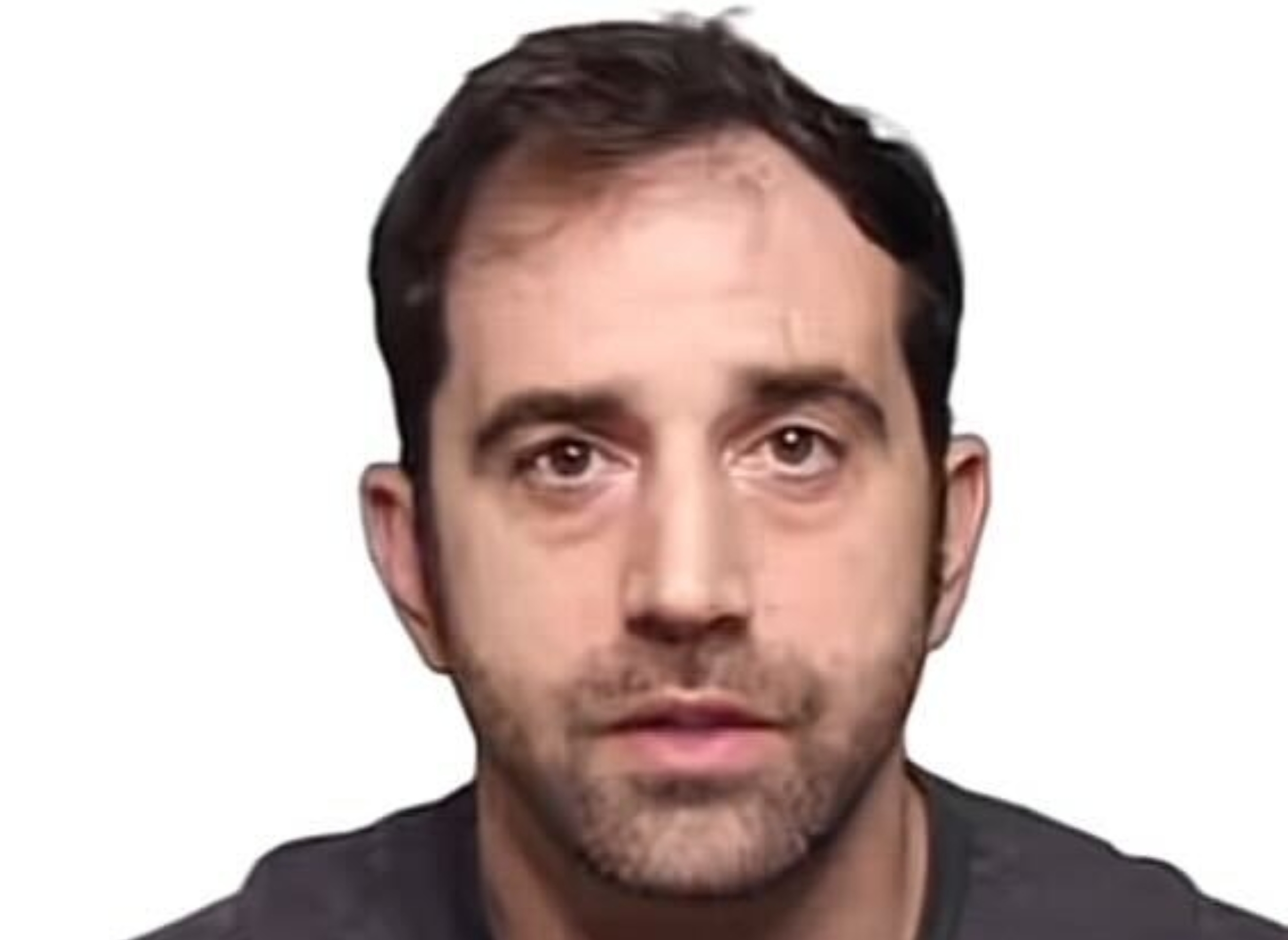 A idiosyncratic   with a neutral look  facing forward, wearing a casual shirt, against a plain achromatic  background