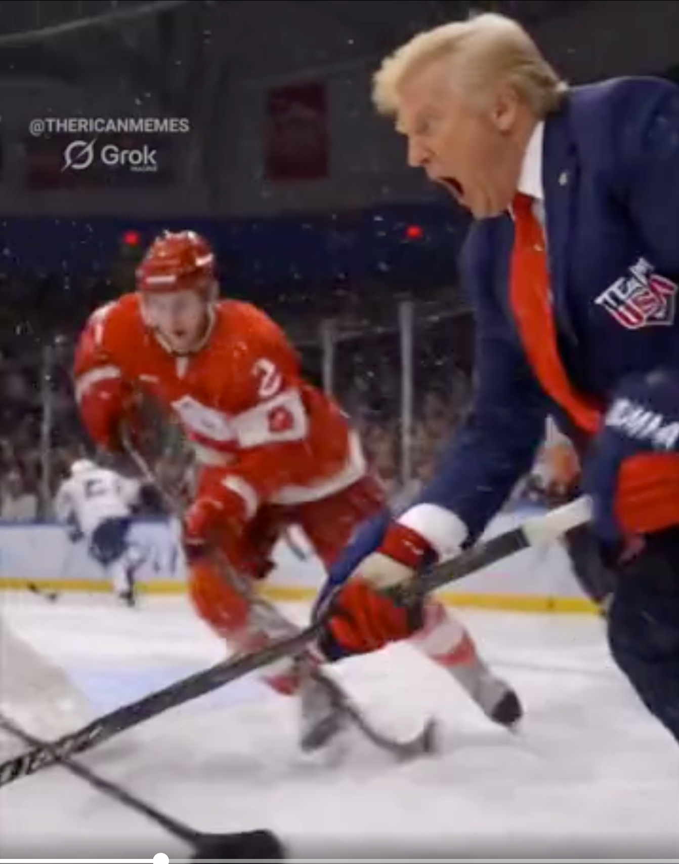 En mann i dress spiller hockey på en skøytebane, og konkurrerer energisk med en spiller i rød uniform