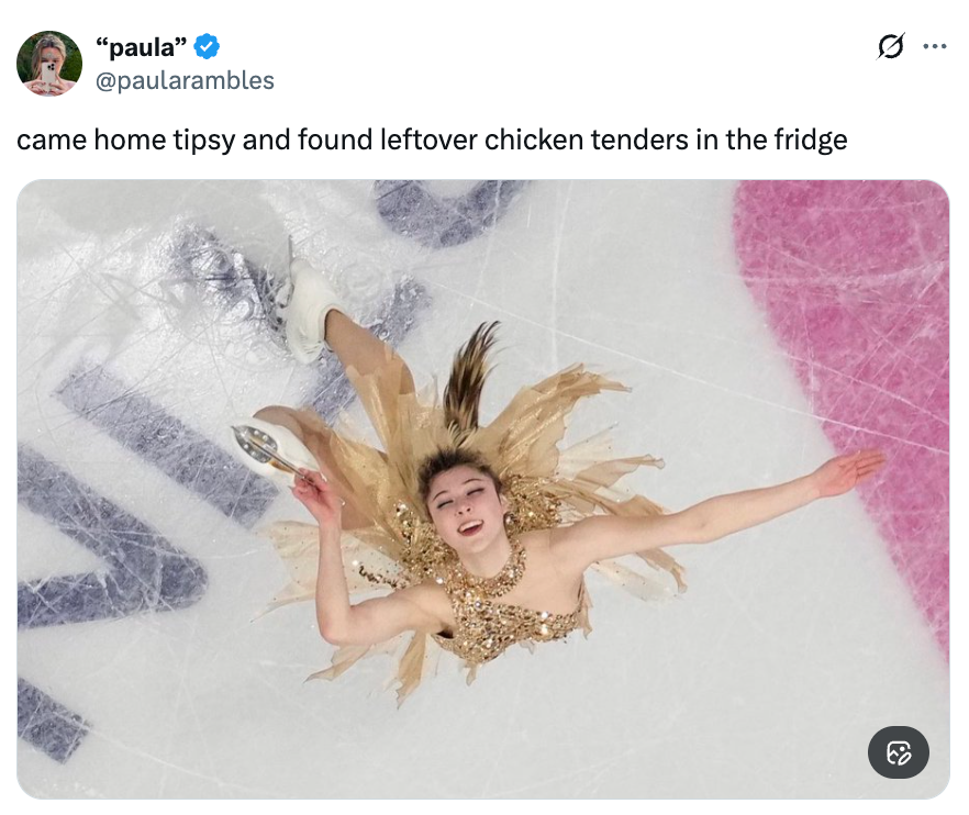 Figure skater successful  an crystal  rink wearing a fringed costume poses mid-spin with arms outstretched. Tweet caption supra  describes uncovering  chickenhearted  tenders