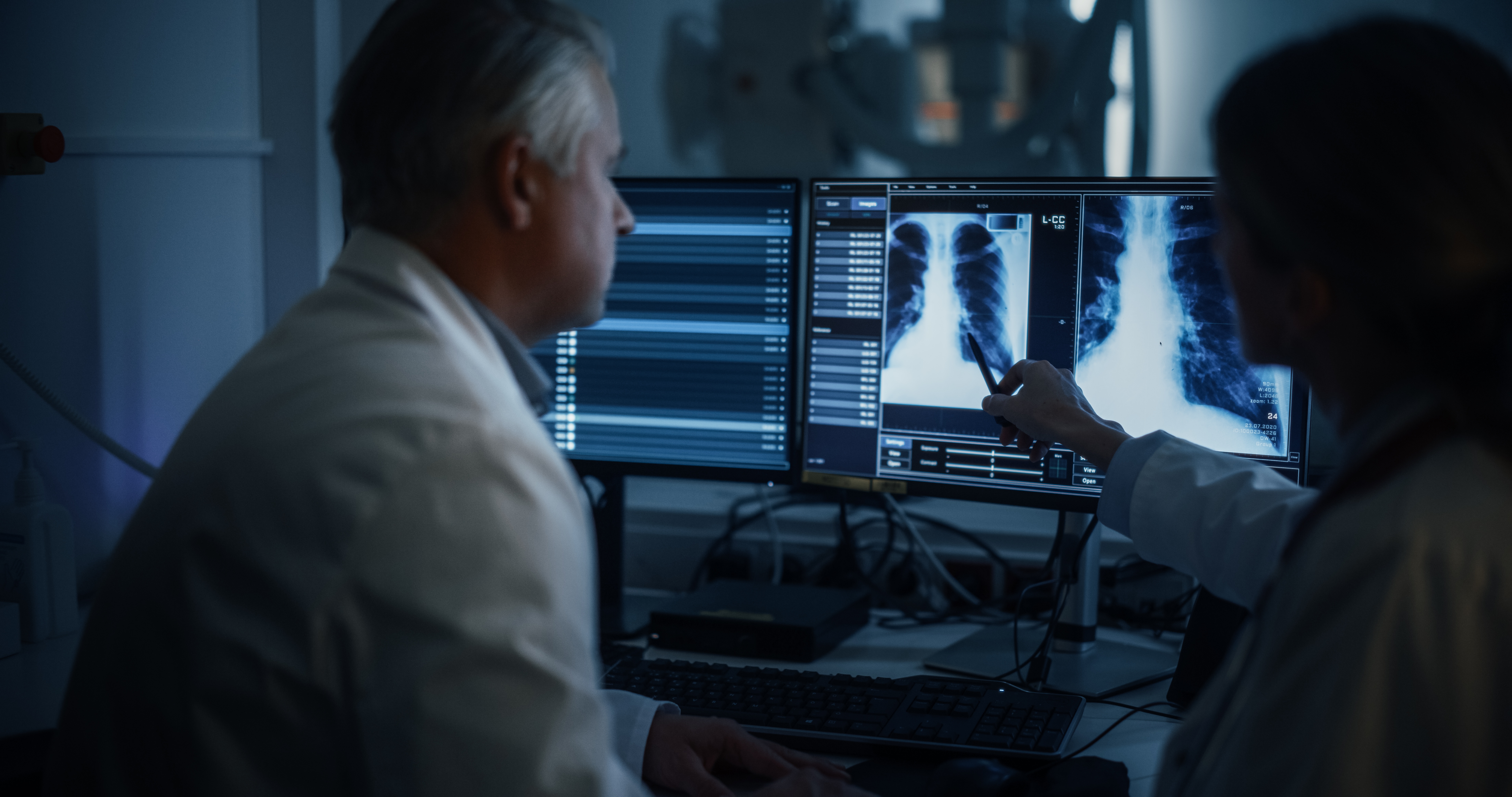 Two radiologists successful a laboratory analyse thorax X-rays connected screen