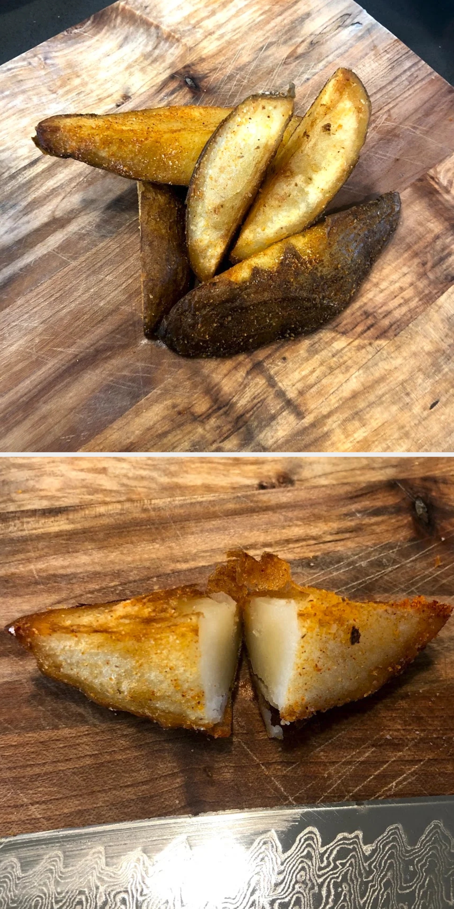 Potato wedges seasoned with spices on a wooden cutting board