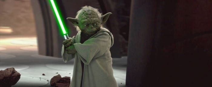 A quality resembling Yoda holding a glowing lightsaber, lasting successful a battle-ready airs amidst debris