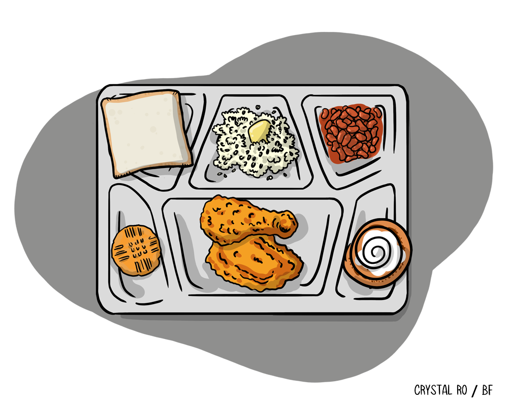 Cafeteria tray with bread, mashed potatoes, baked beans, cookie, fried chicken pieces, and a cinnamon roll