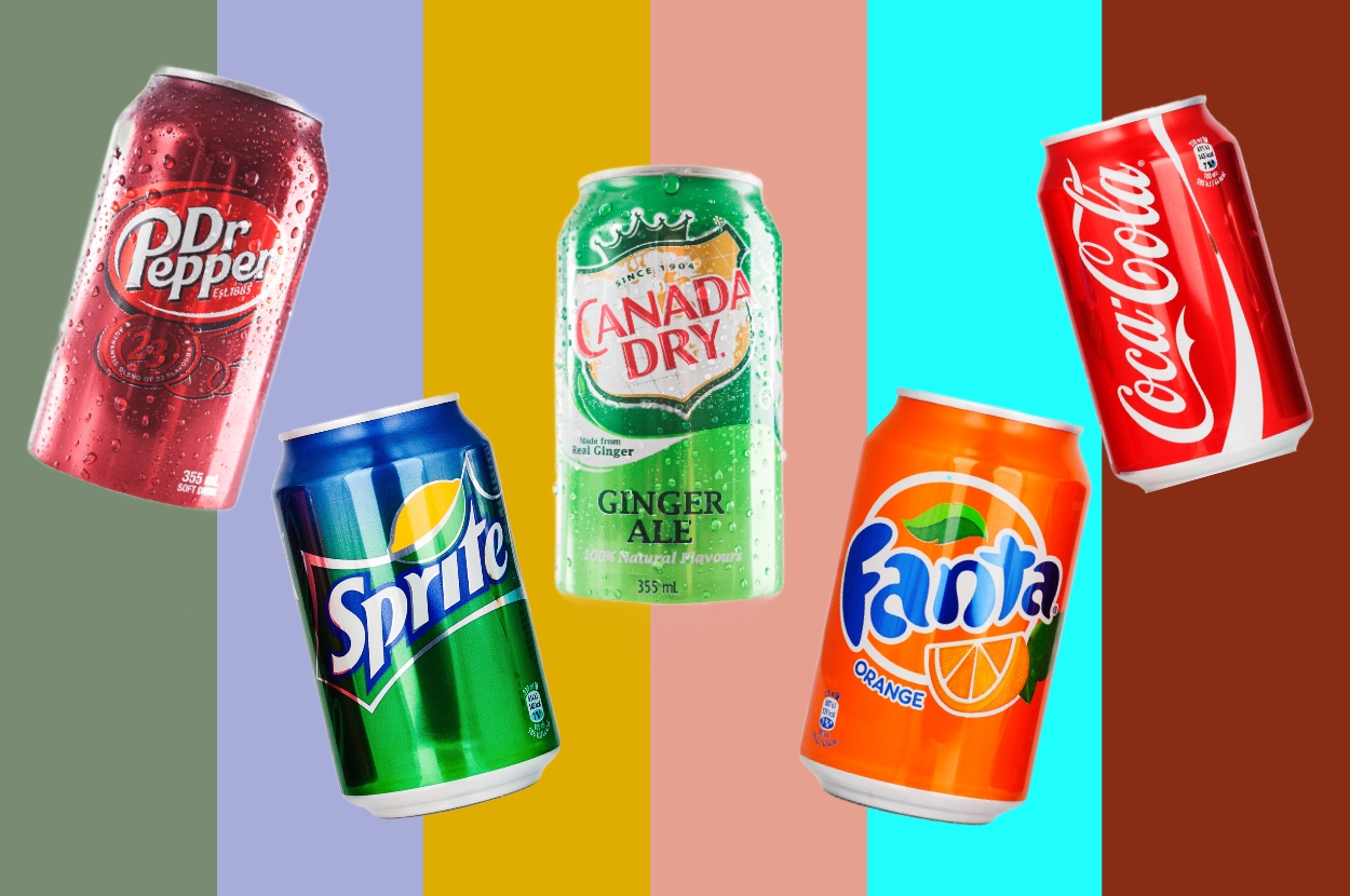 Various soda cans including Dr. Pepper, Canada Dry, Coca-Cola, Sprite, and Fanta against a striped background