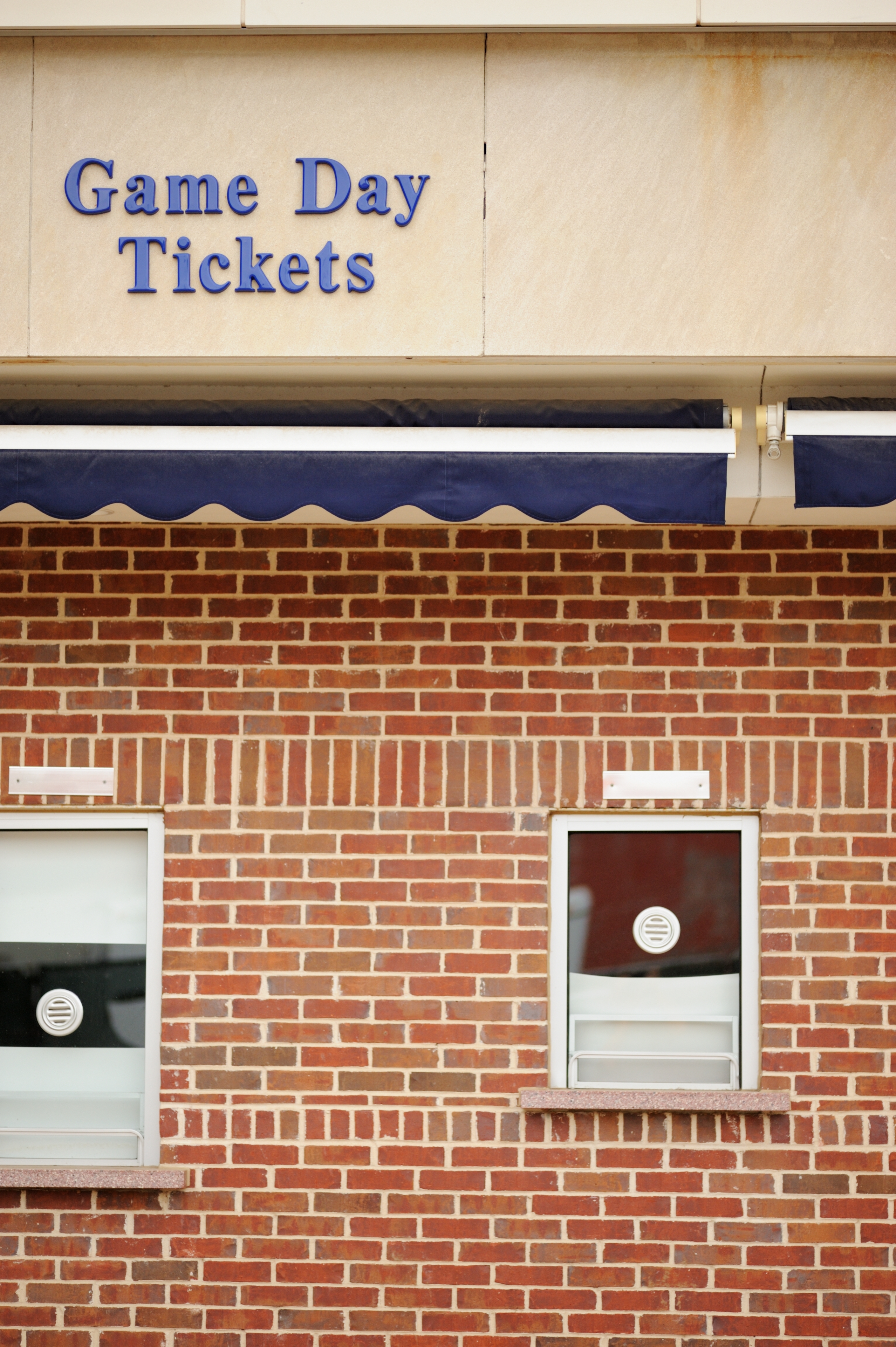 Ticket booth with “Game Day Tickets” motion   above, located successful  a ceramic  building