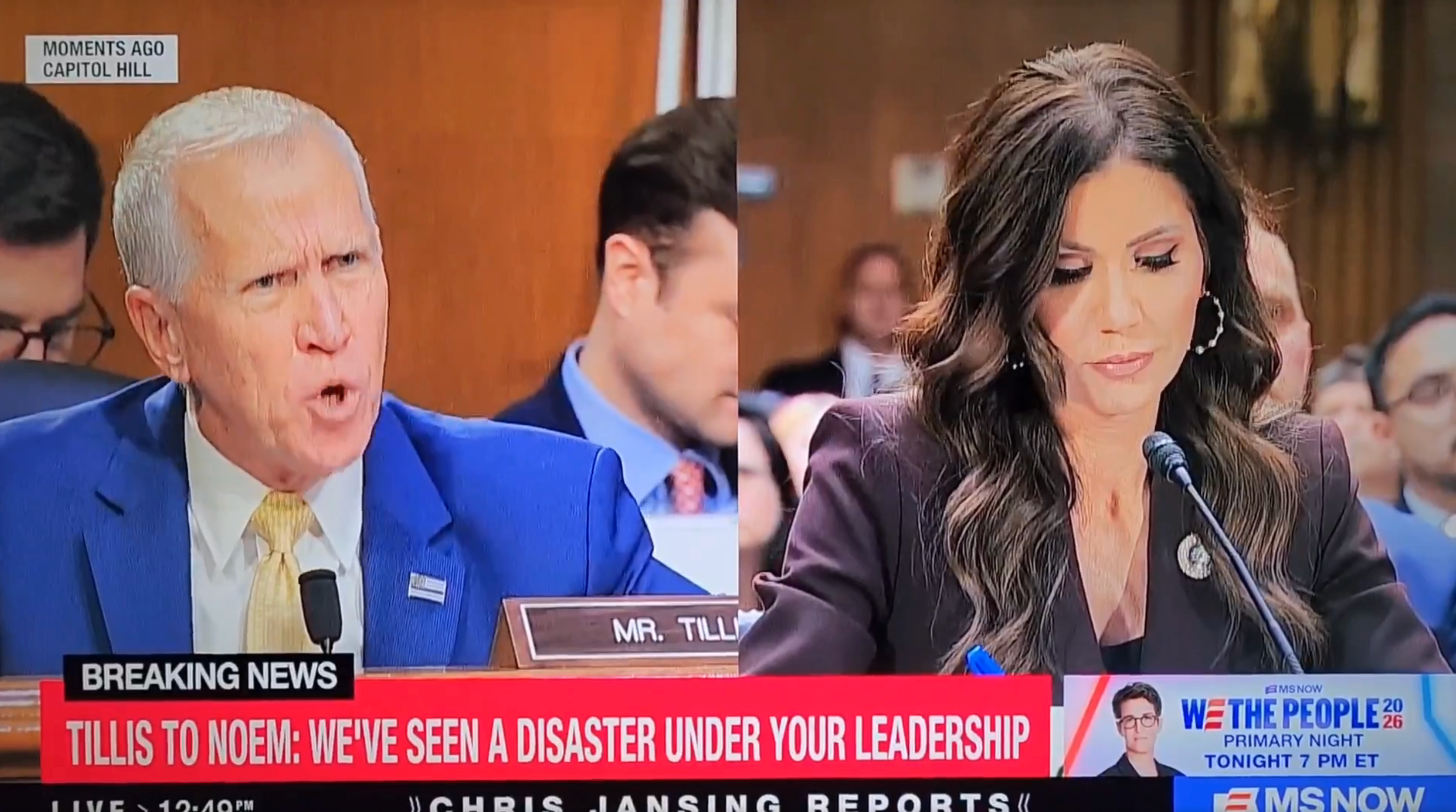 pistillate listening intently, holding a pen