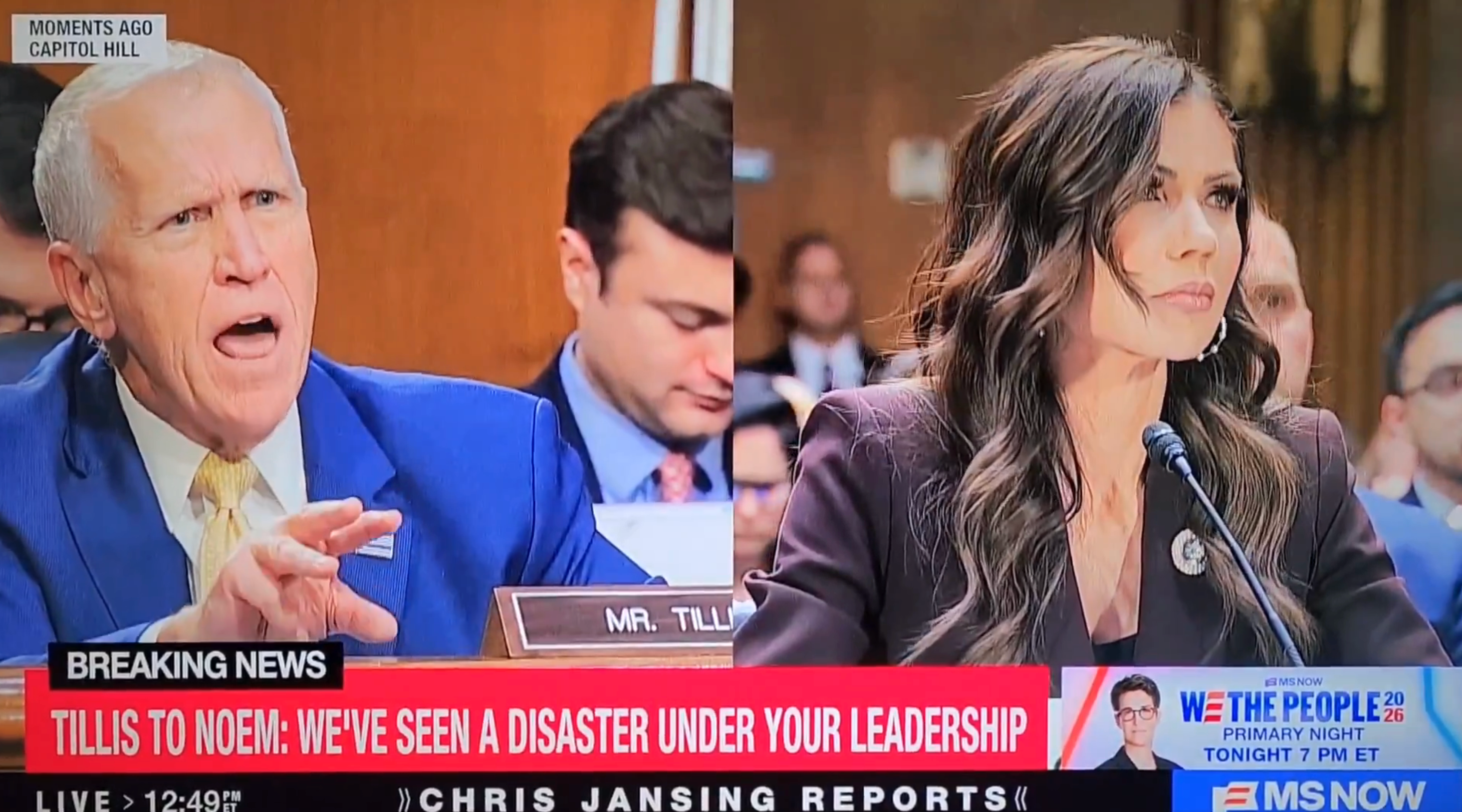 A person speaks animatedly astatine a proceeding portion different listens attentively. Lower surface displays a quality ticker and TV programme preview