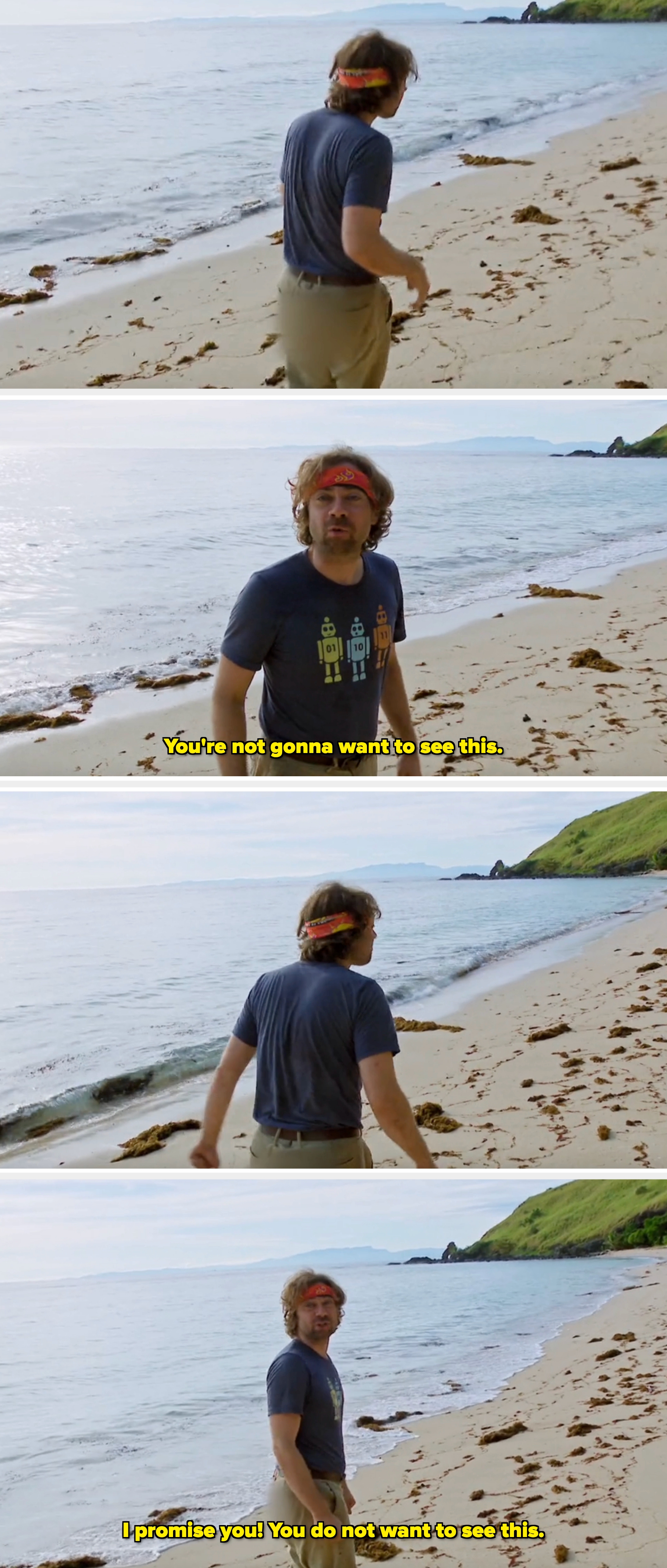 Person walking on  a sandy formation  with seaweed scattered around, wearing casual pants and a t-shirt, with a headband